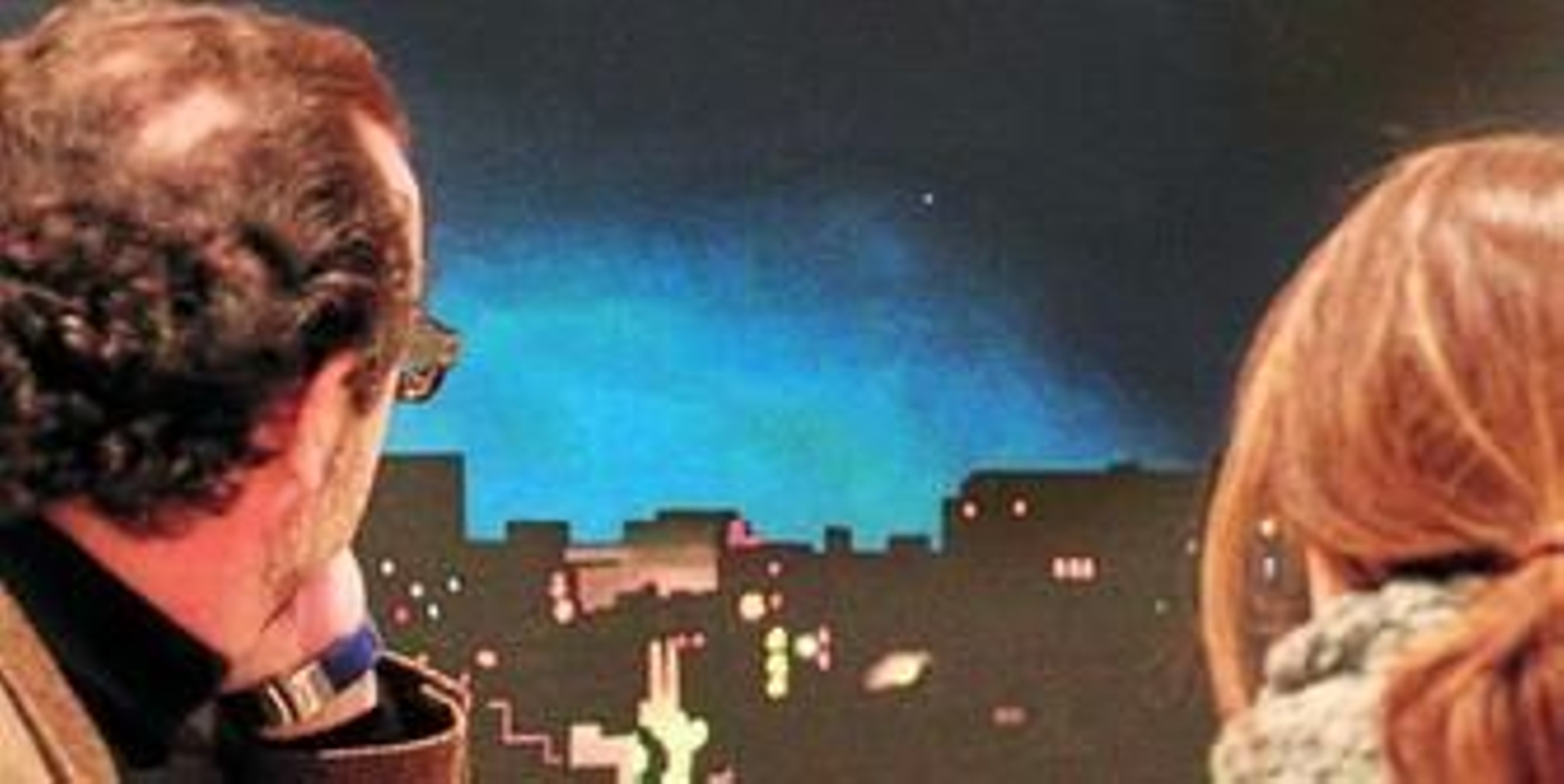 Javier Buzón (Sevilla, 1958) ante uno de los paisajes nocturnos que pueden verse en la antología que le dedica la Casa de la Provincia hasta el 28 de febrero.