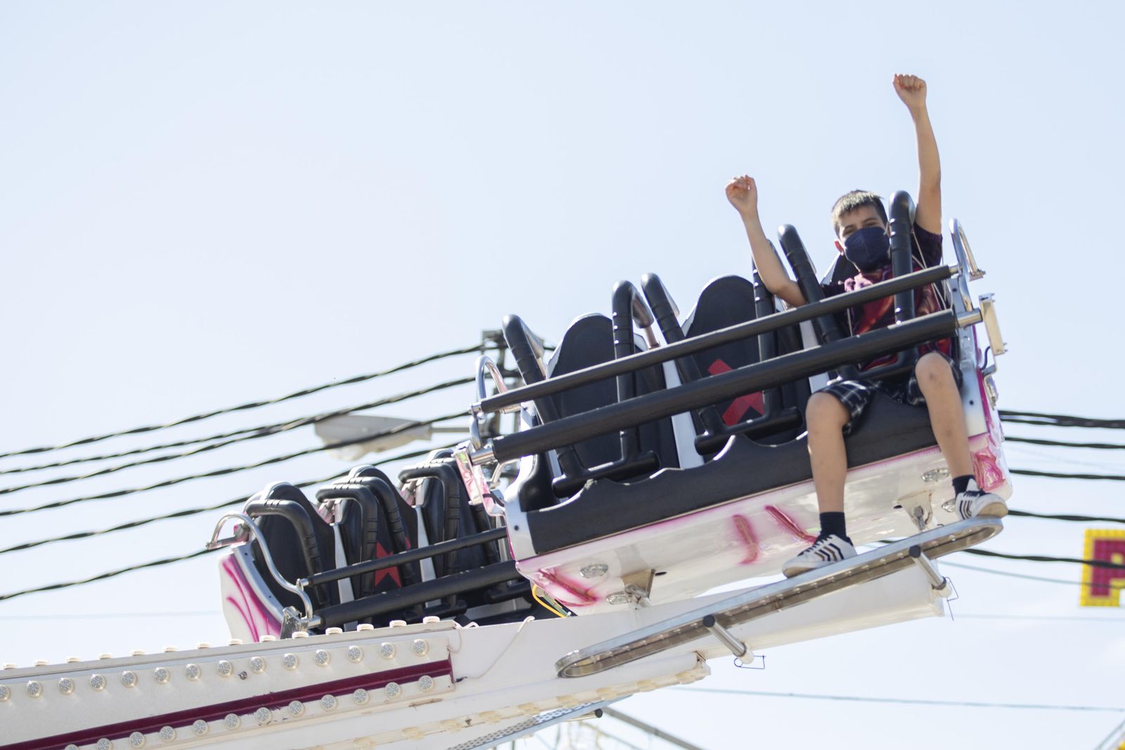 Fotos: el ferial de Granada cobra vida con los columpios
