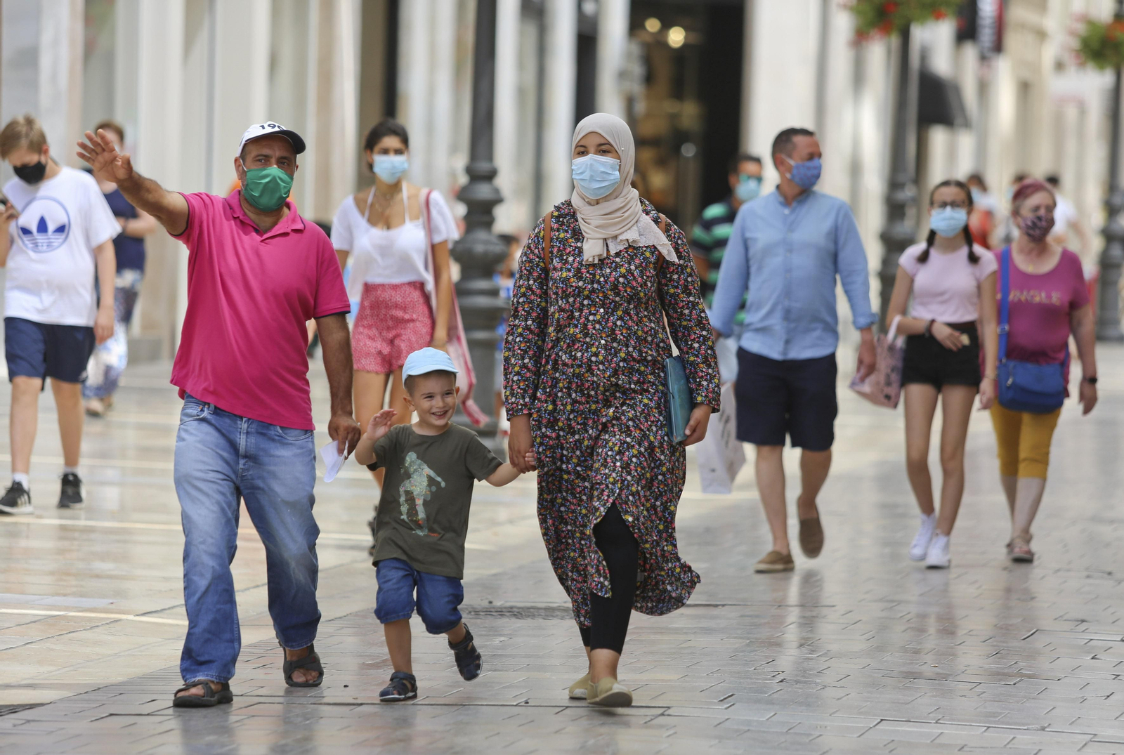 Fotos del primer día de mascarillas obligatorias en las playas y el Centro de Málaga