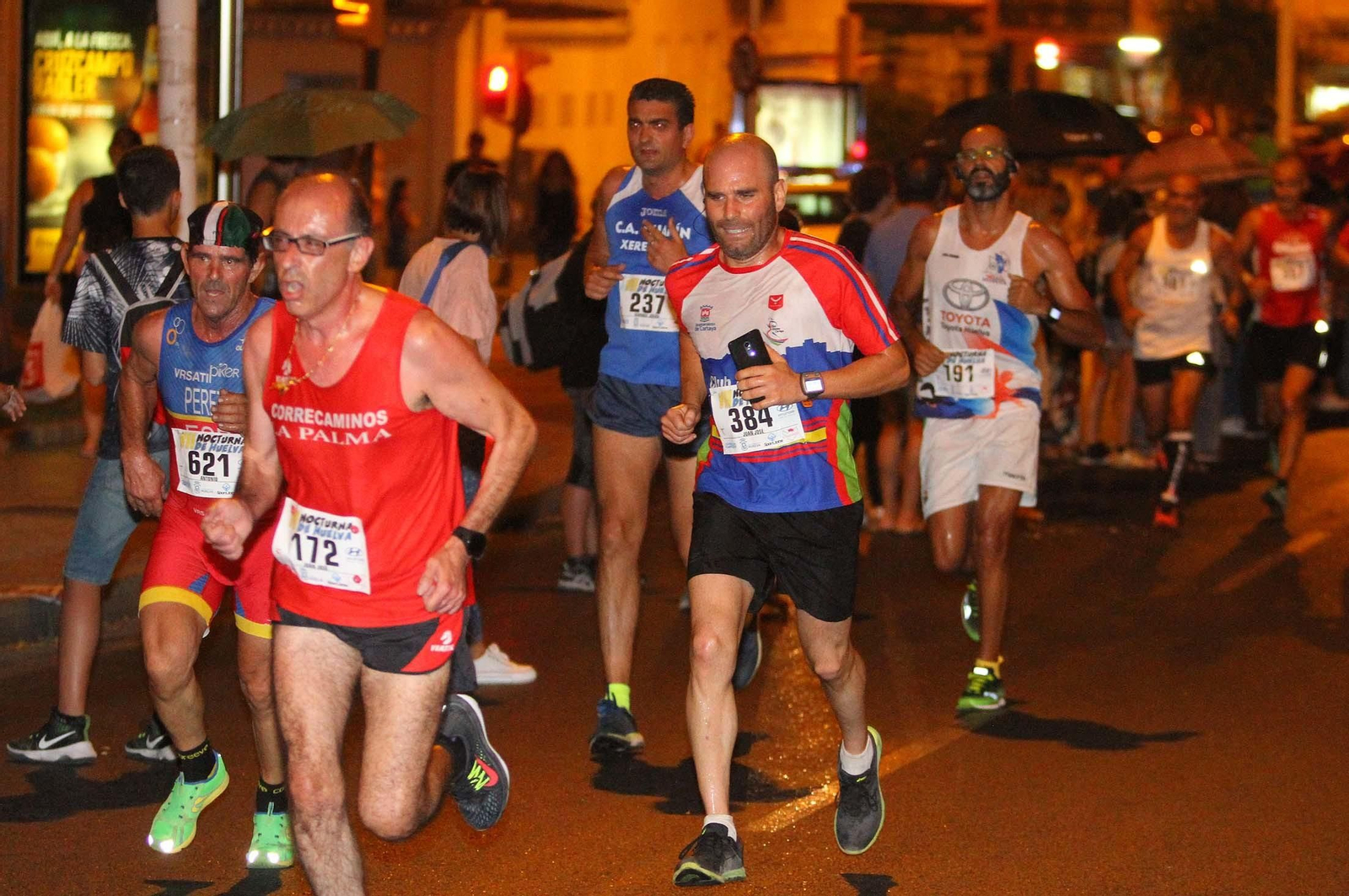 La VII Carrera Nocturna de Huelva en imágenes