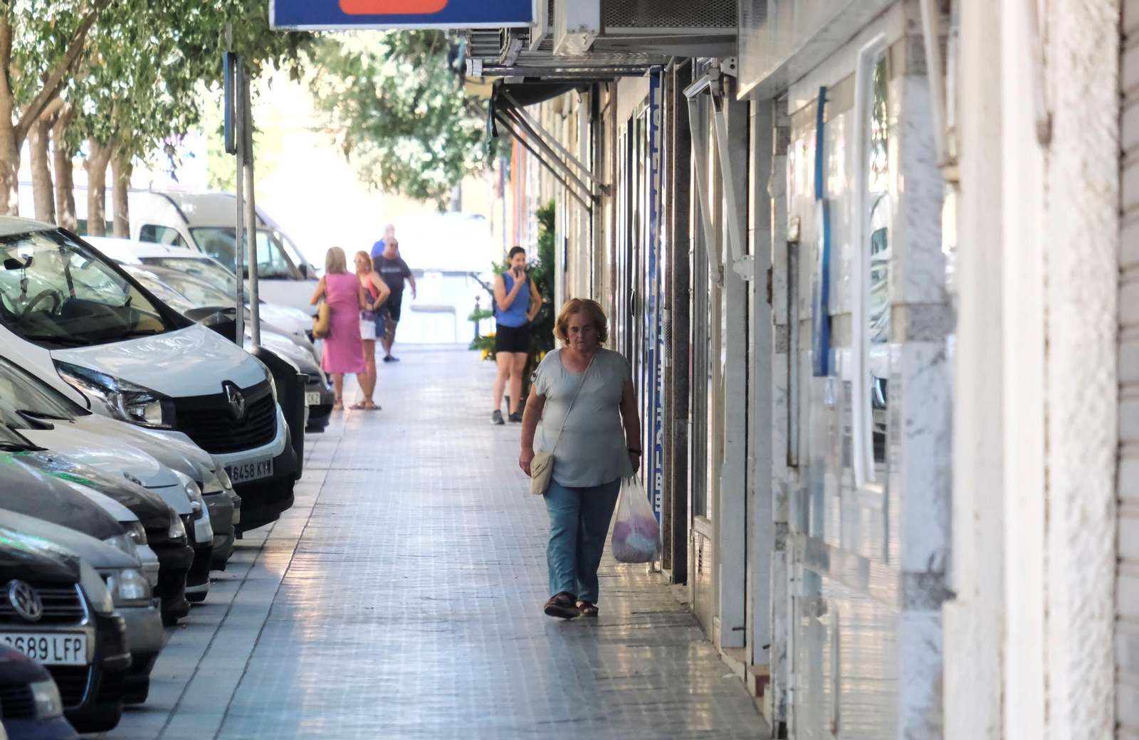 Un día de agosto en el barrio de la Viñuela de Córdoba, en imágenes