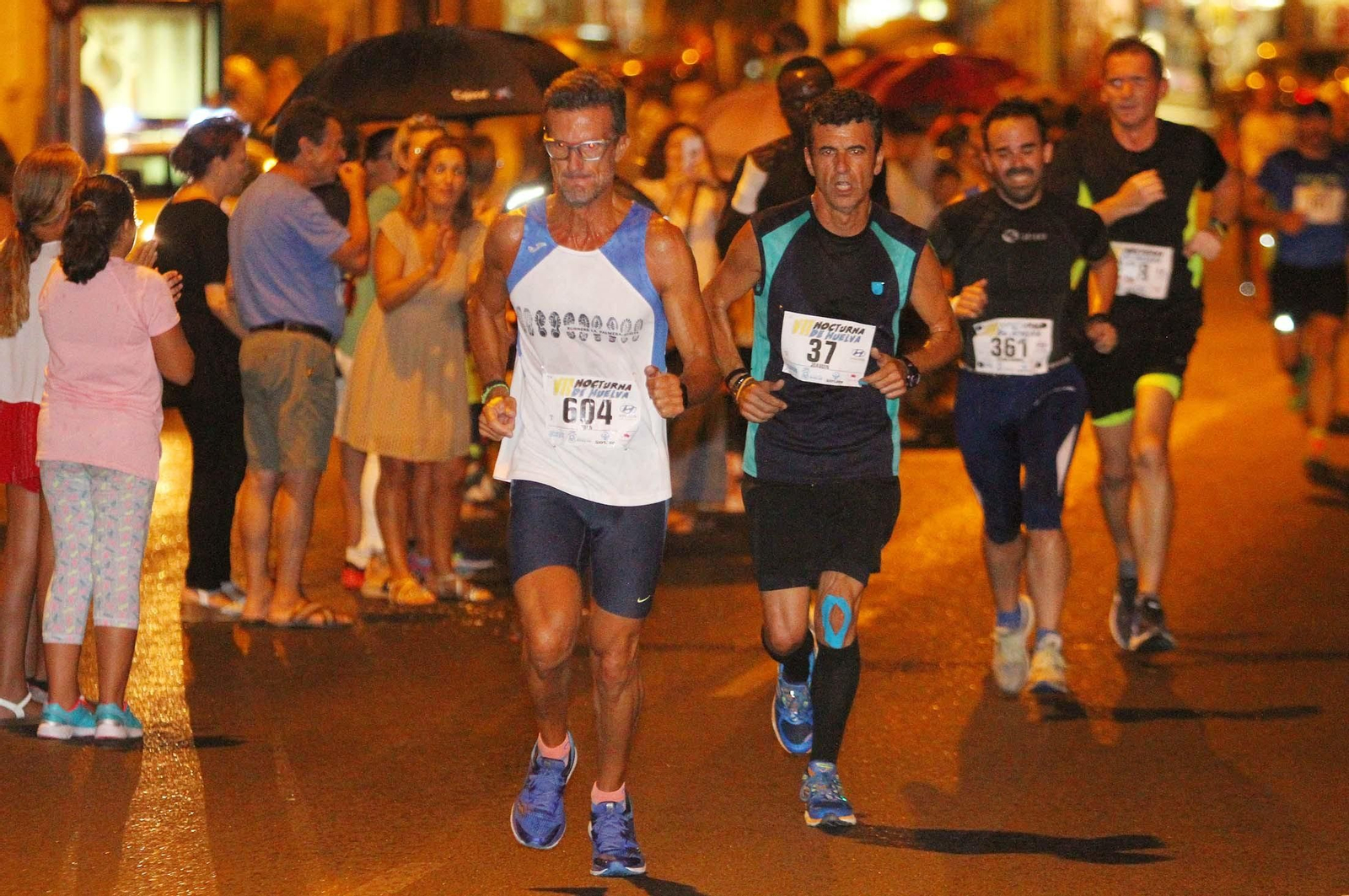 La VII Carrera Nocturna de Huelva en imágenes