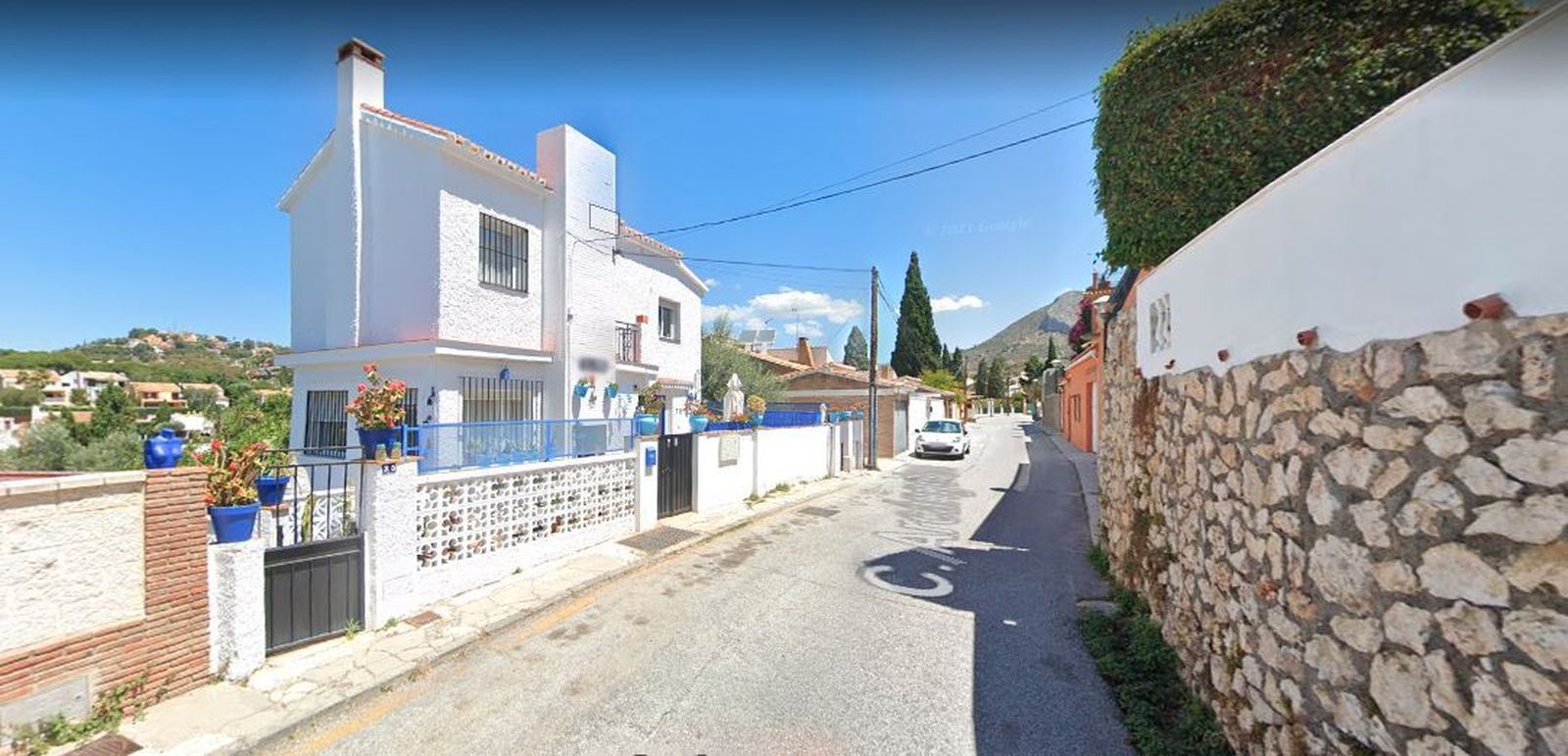 Vista de un tramo de la calle Arcángeles, en Málaga.
