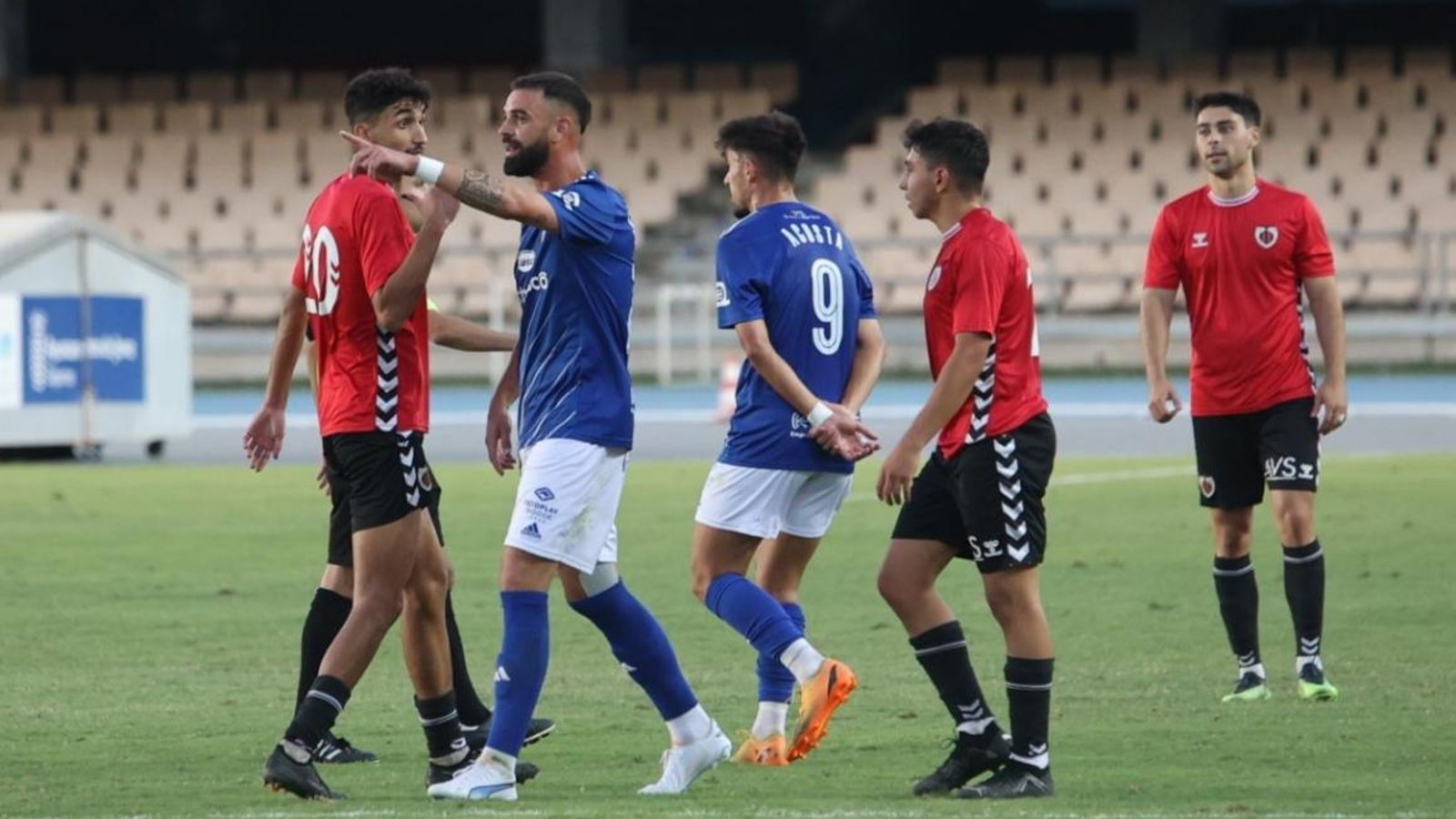 Juan Delgado, junto a Ulloa a la finalización del partido contra el Cartaya.