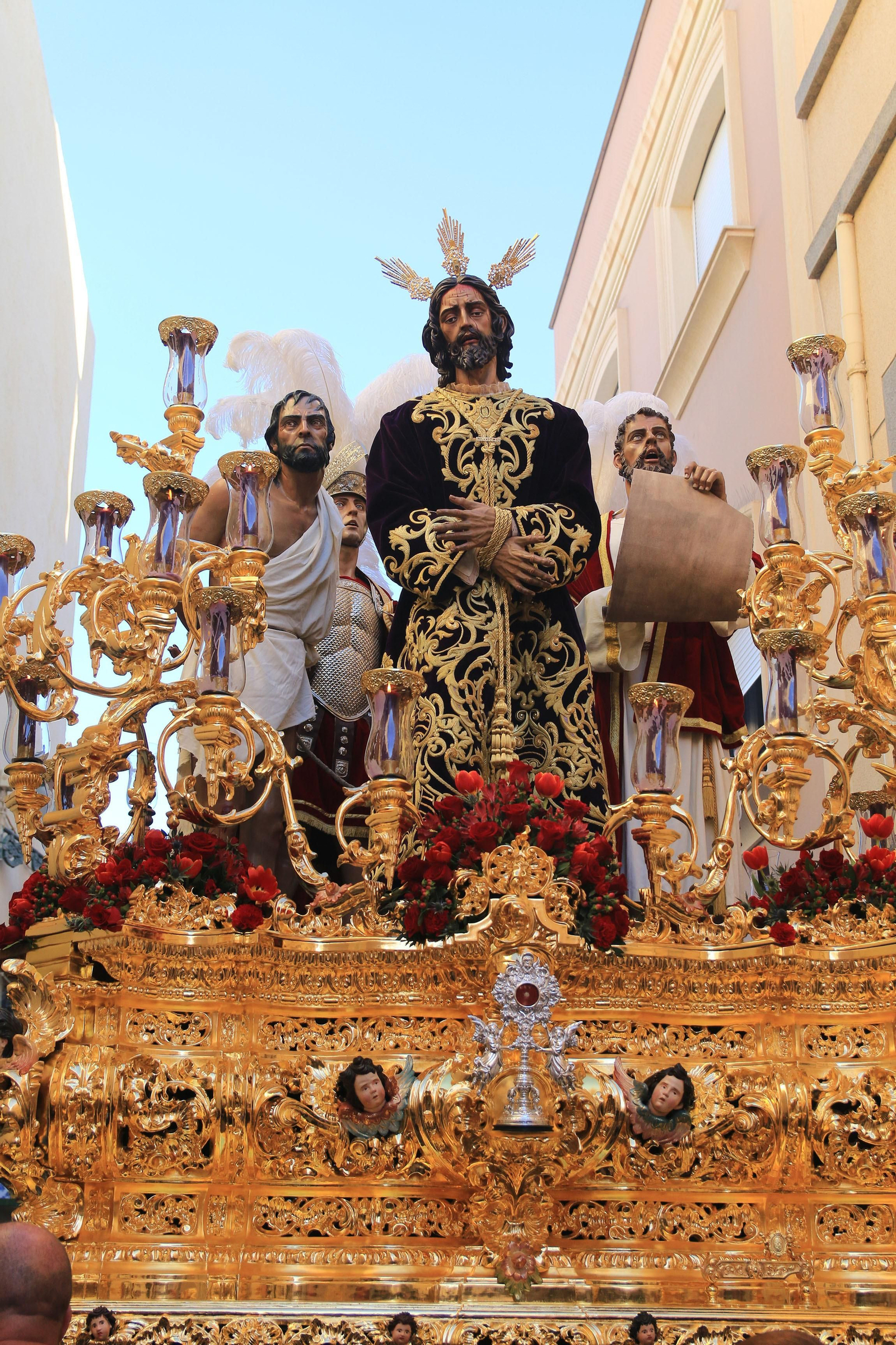 La procesión de la Macarena, en imágenes