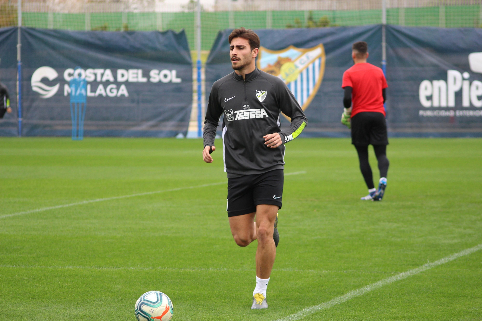 La vuelta a los entrenamientos del Málaga, en fotos