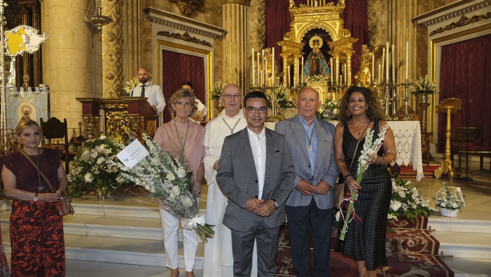 Imágenes de la ofrenda floral a la Virgen del Mar. Feria de Almería 2022
