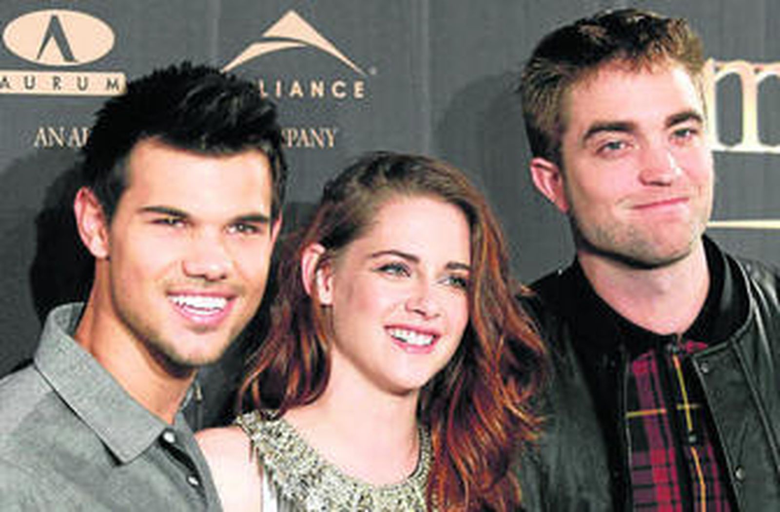 Lautner, Stewart y Pattinson, ayer, en la presentación en Madrid de 'Amanecer Parte 2'.