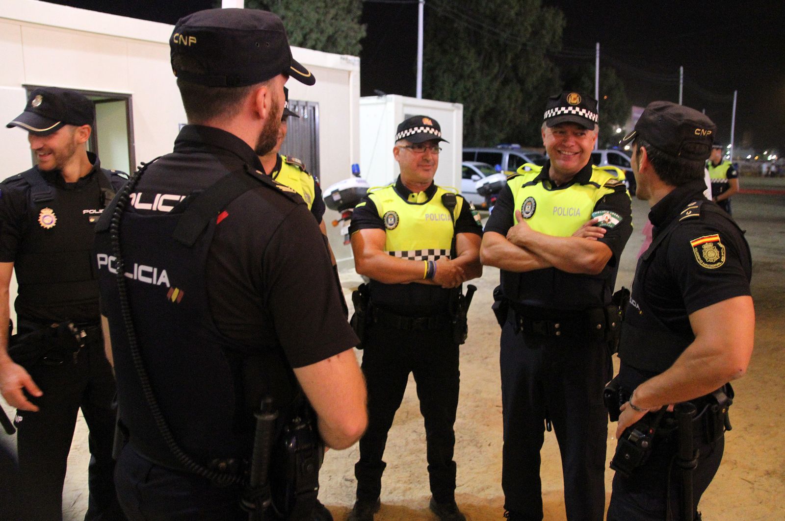 Policía nacionales y locales en las Fiestas Colombinas de Huelva.