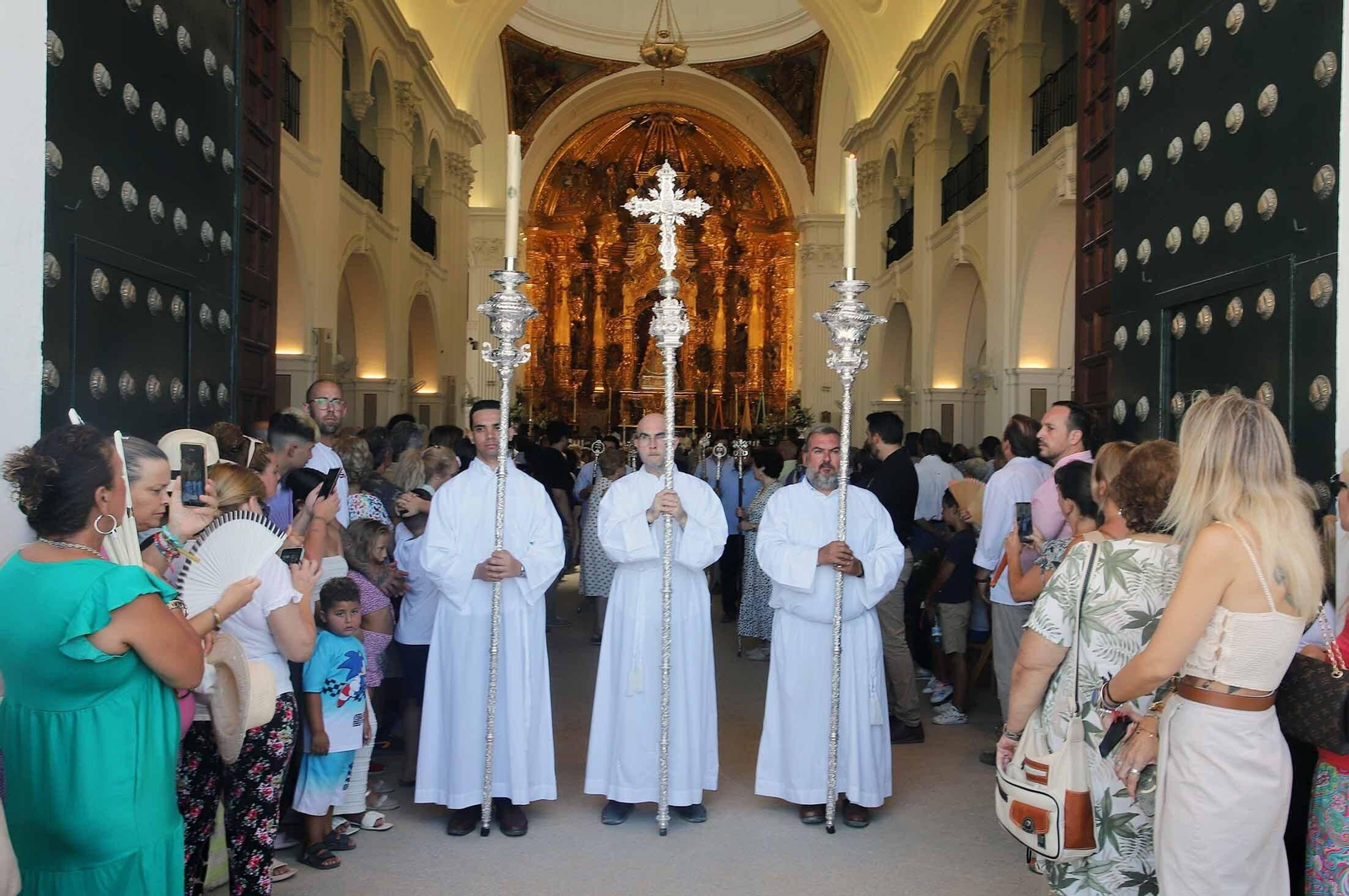 Imágenes de la procesión eucarística y solemne Función del Voto en El Rocío Chico