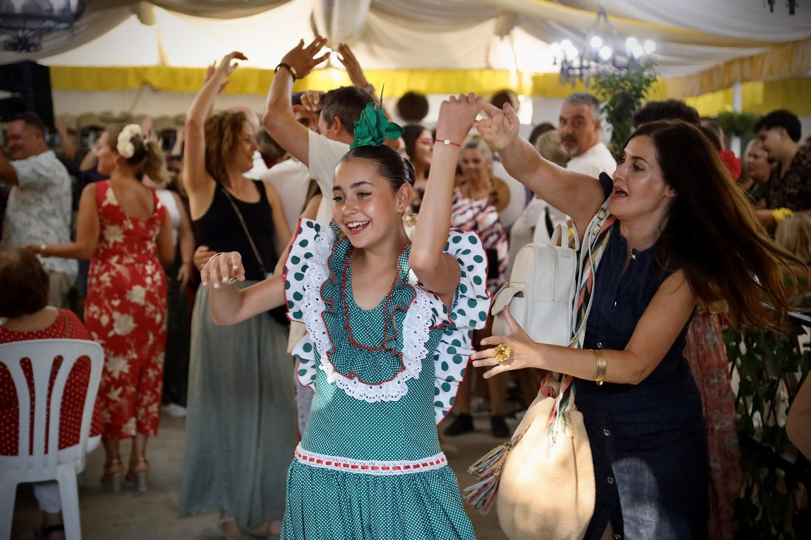 El ambiente en el Real de la Feria de Málaga este viernes, en imágenes