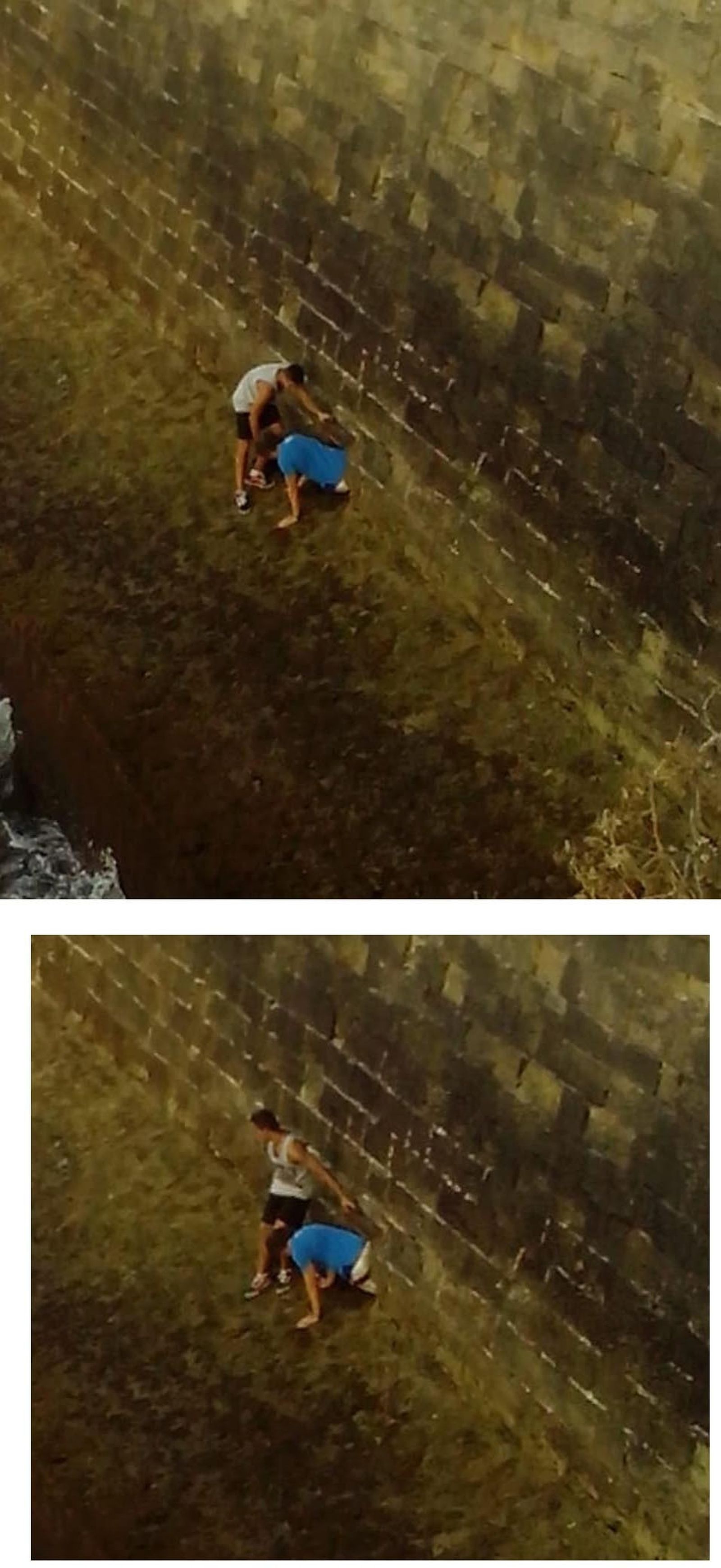 Dos jóvenes acceden a través de una galería subterránea que se encuentra en la muralla de la Alameda.