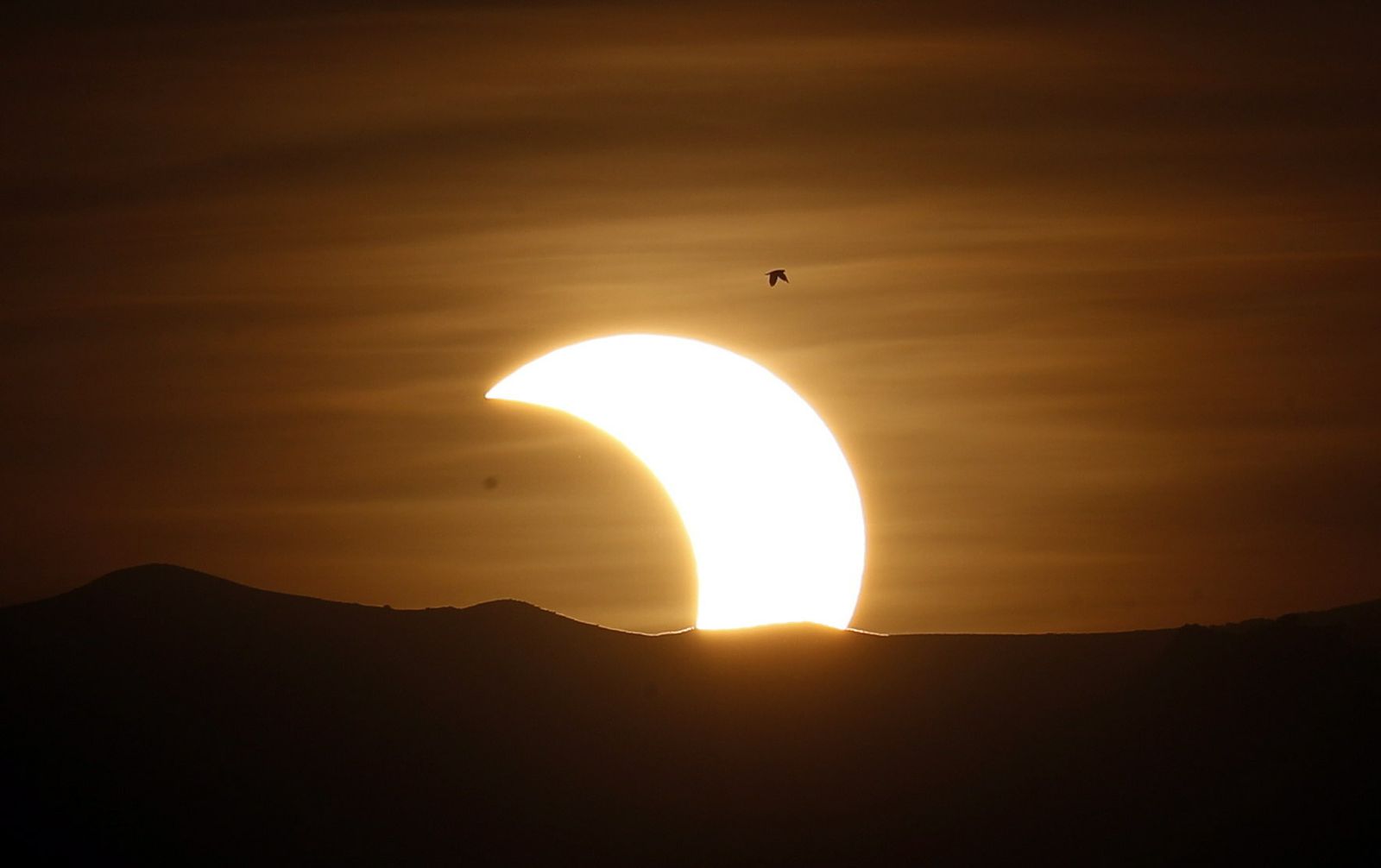Las imágenes del último eclipse solar de la década