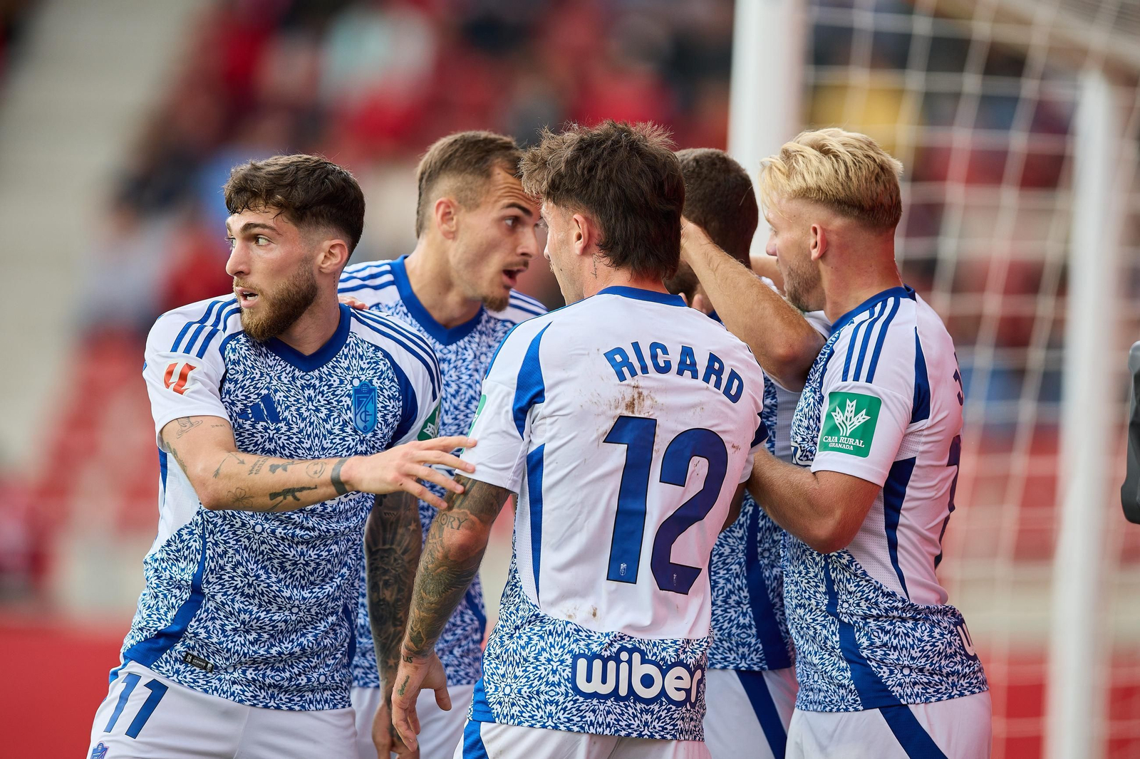 Los jugadores del Granada celebran el gol ante el Mirandés