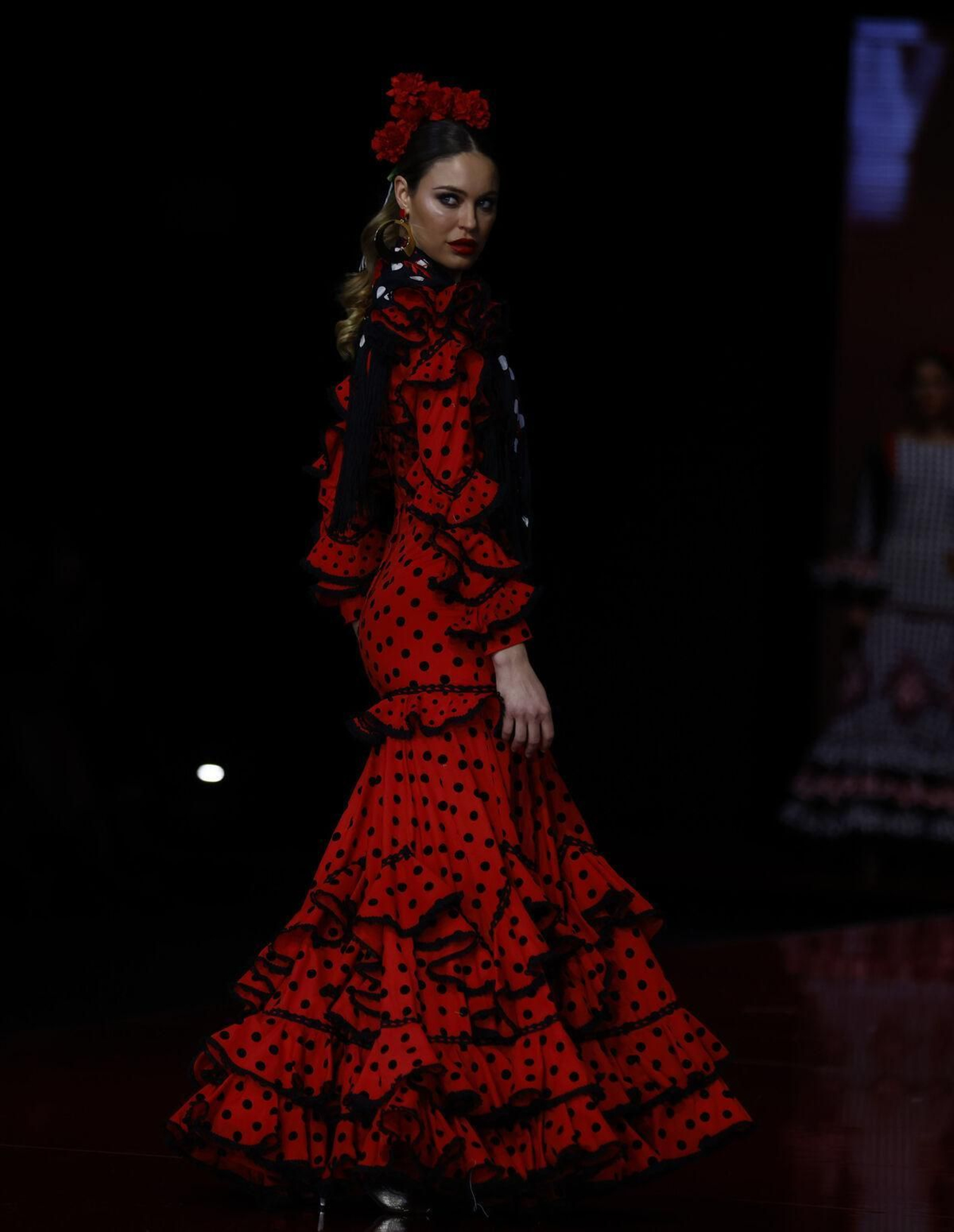 Traje de flamenca rojo y negro de Pilar Vera.