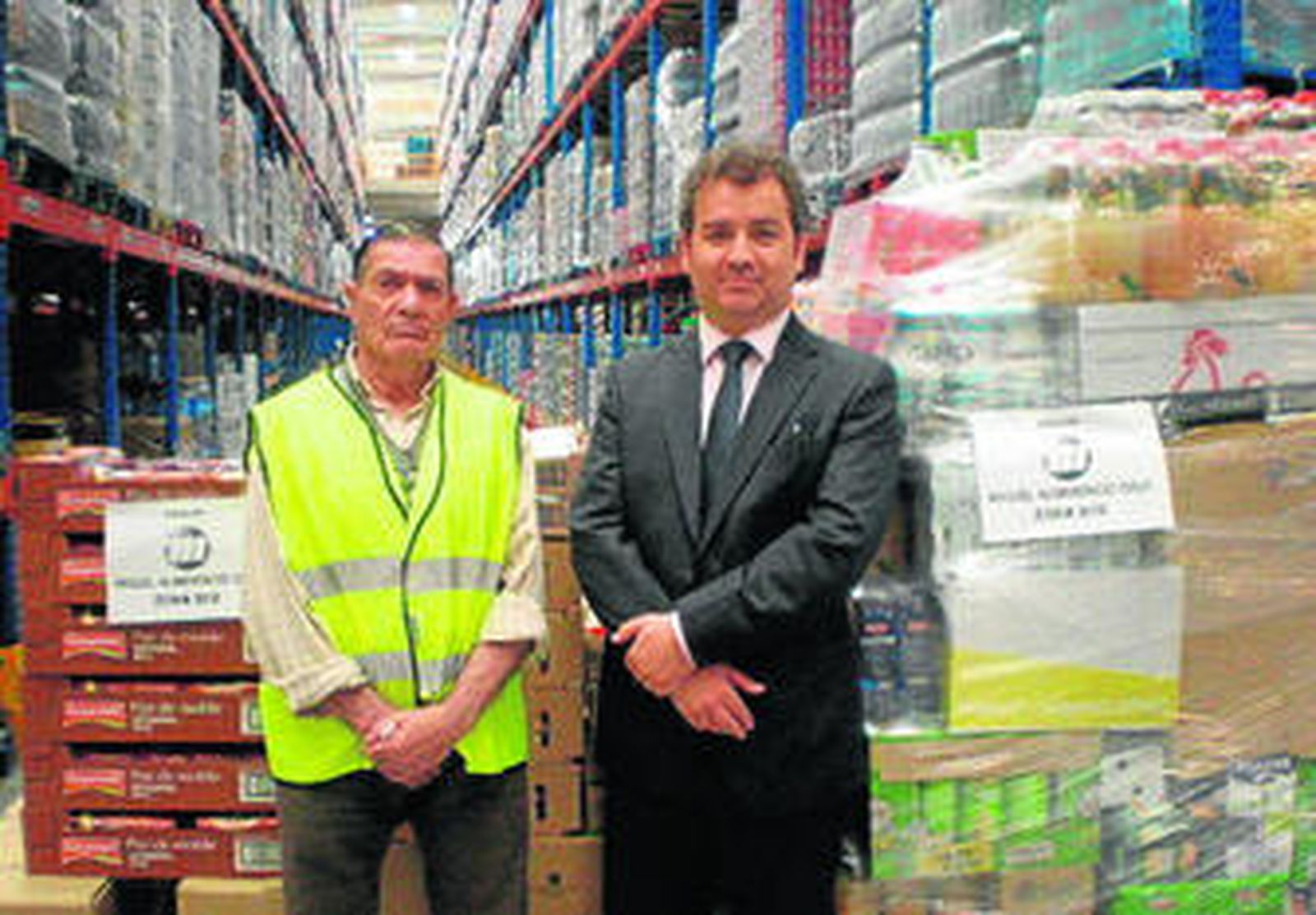 Carmelo Rueda, de Bancosol, y Juan Ignacio Fajardo de la compañía alimentaria.