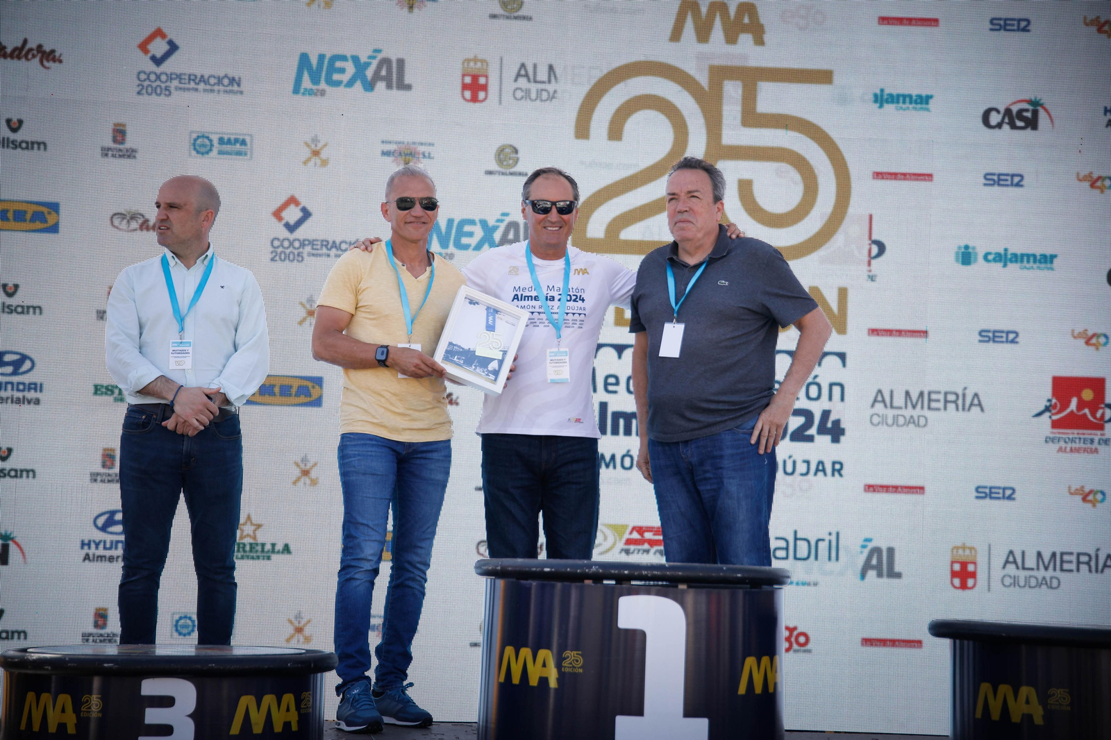 Imágenes de los premiados en la Media maratón de la Cuidad de Almería