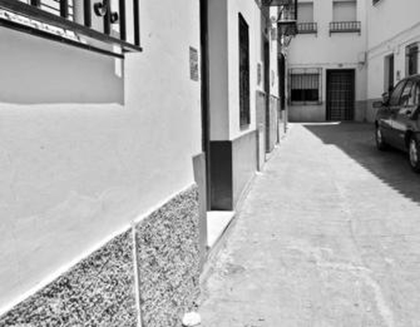 Imagen de una de las fachada con las grietas ya reparadas.