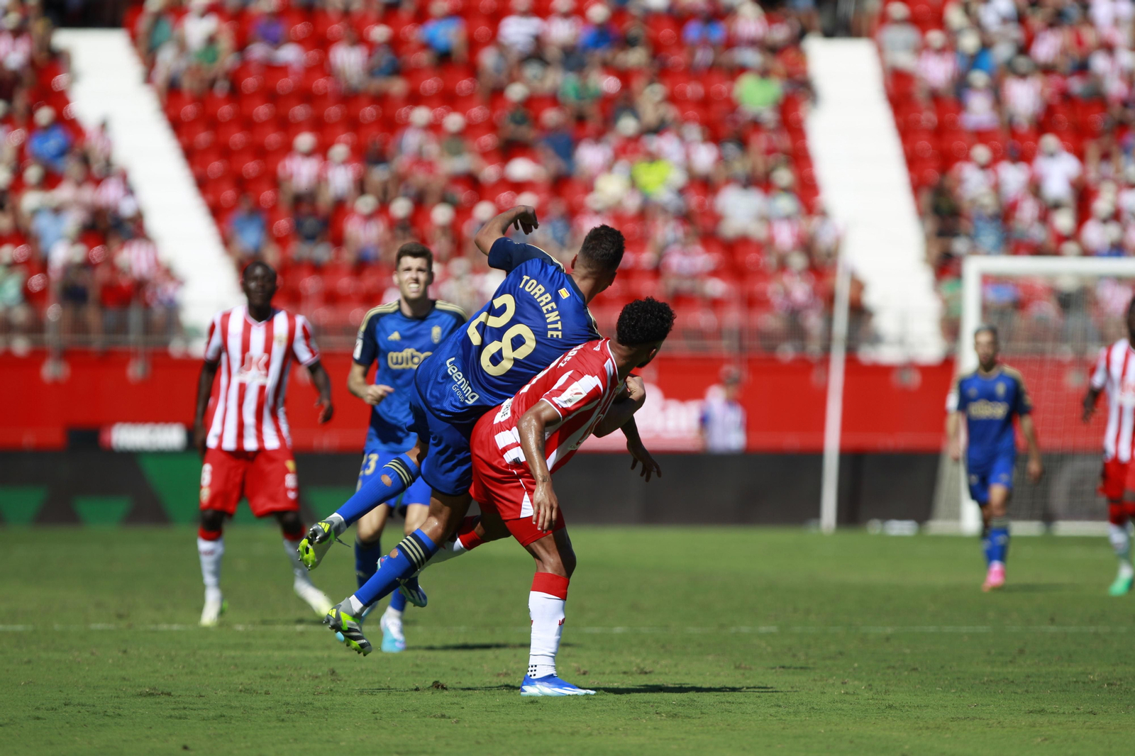 Imágenes del empate a 3 de la U.D. Almería y el Granada C.F.