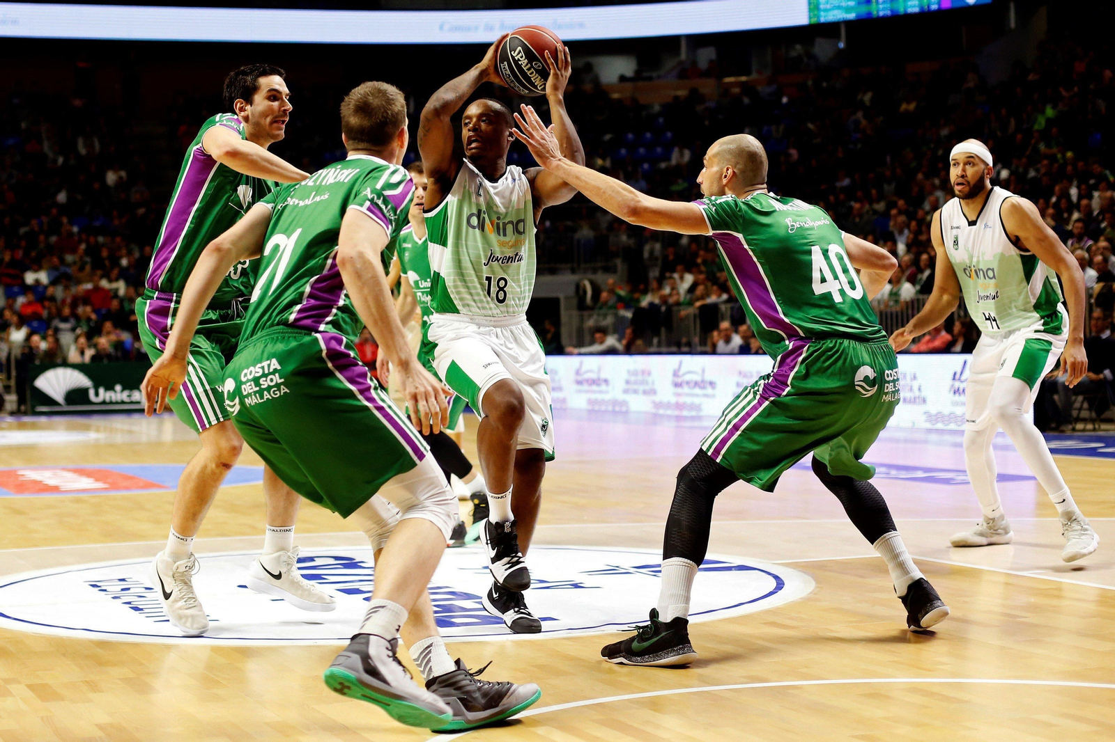 Los cinco años de Adam Waczynski en el Unicaja, en fotos