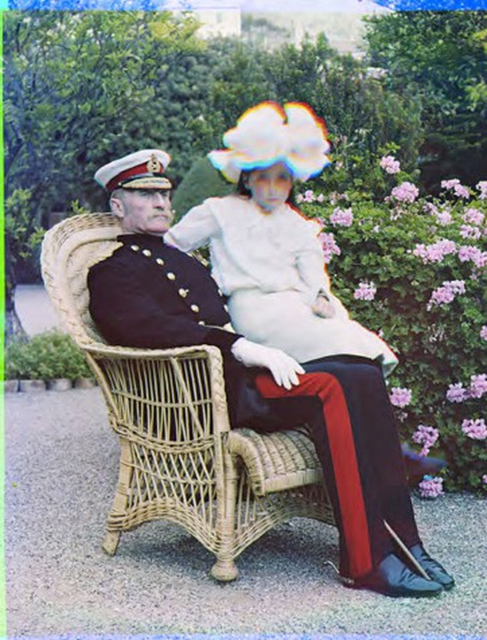 'George Stuart White and Georgina Mary (‘Georgie’) White (1897-1985), seated in the garden of the Convent'.