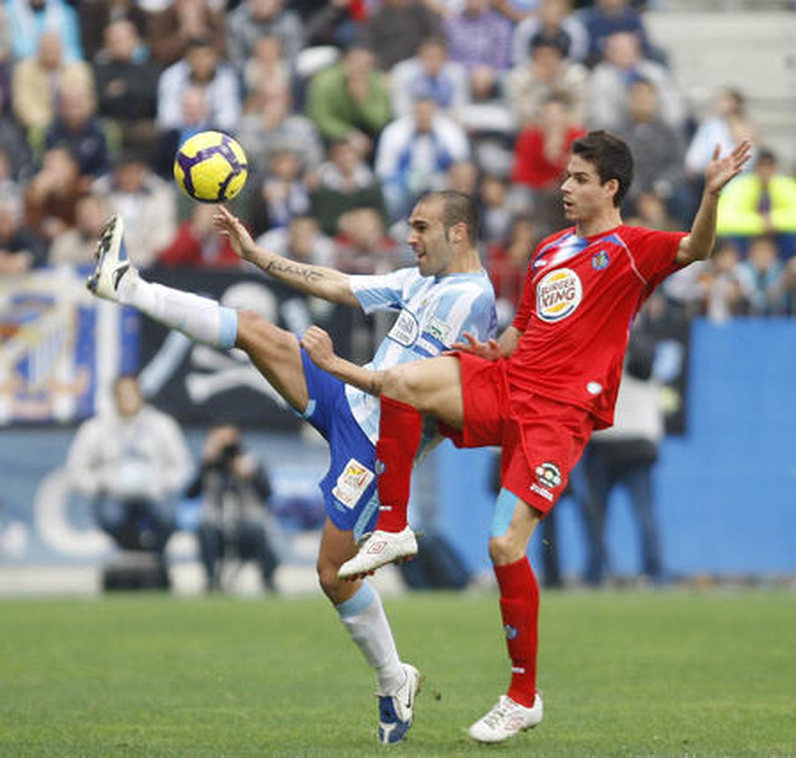El Málaga respira tras su victoria en Liga ante el Getafe. / Sergio Camacho