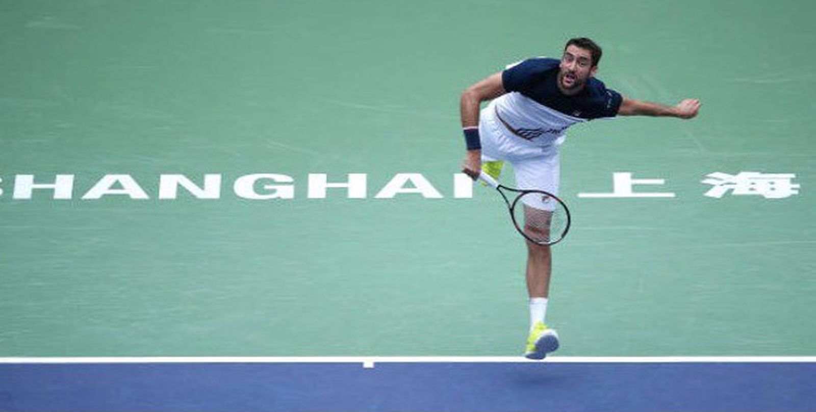 Cilic. durante un saque en el partido