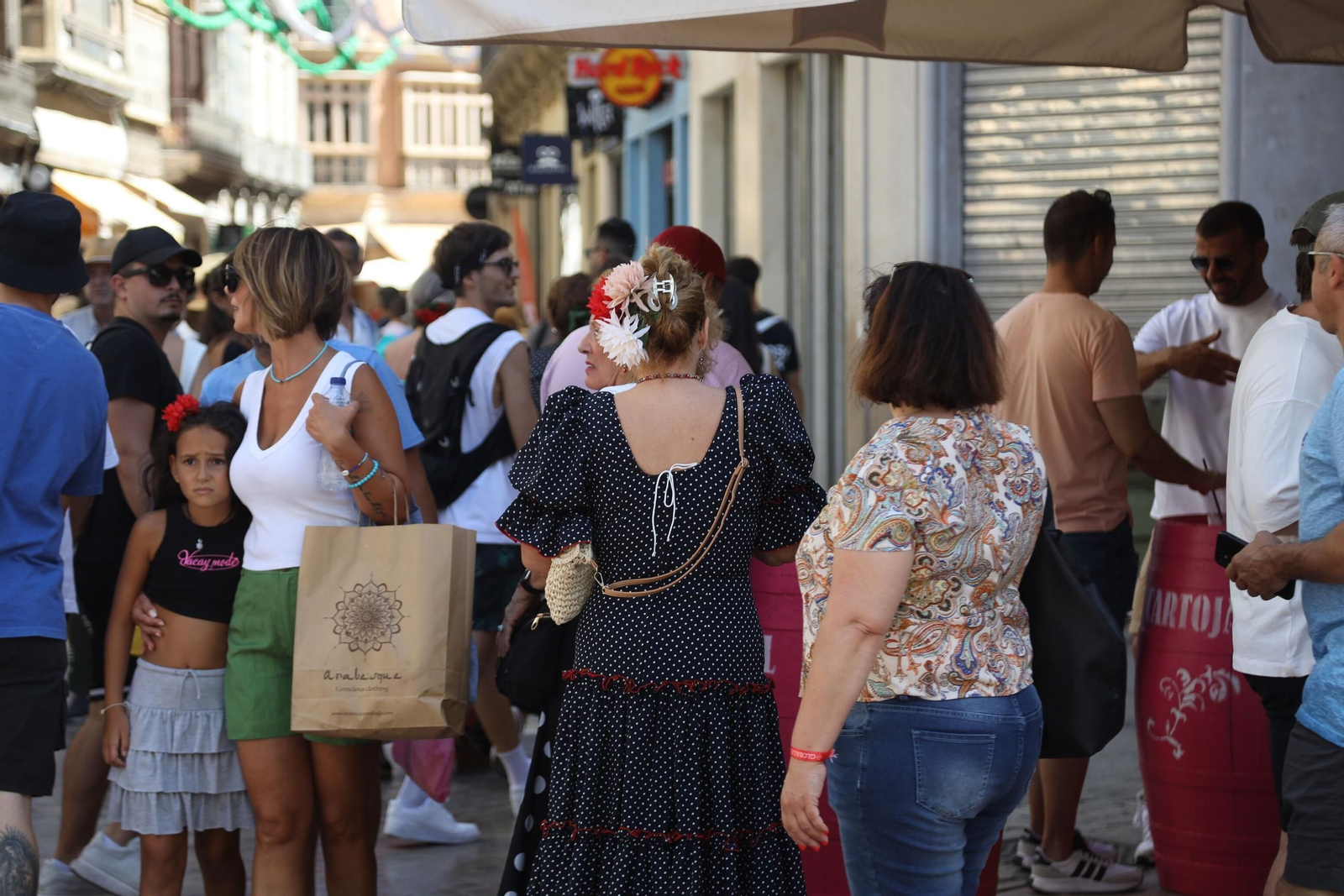 El miércoles de Feria en el Centro de Málaga, en imágenes