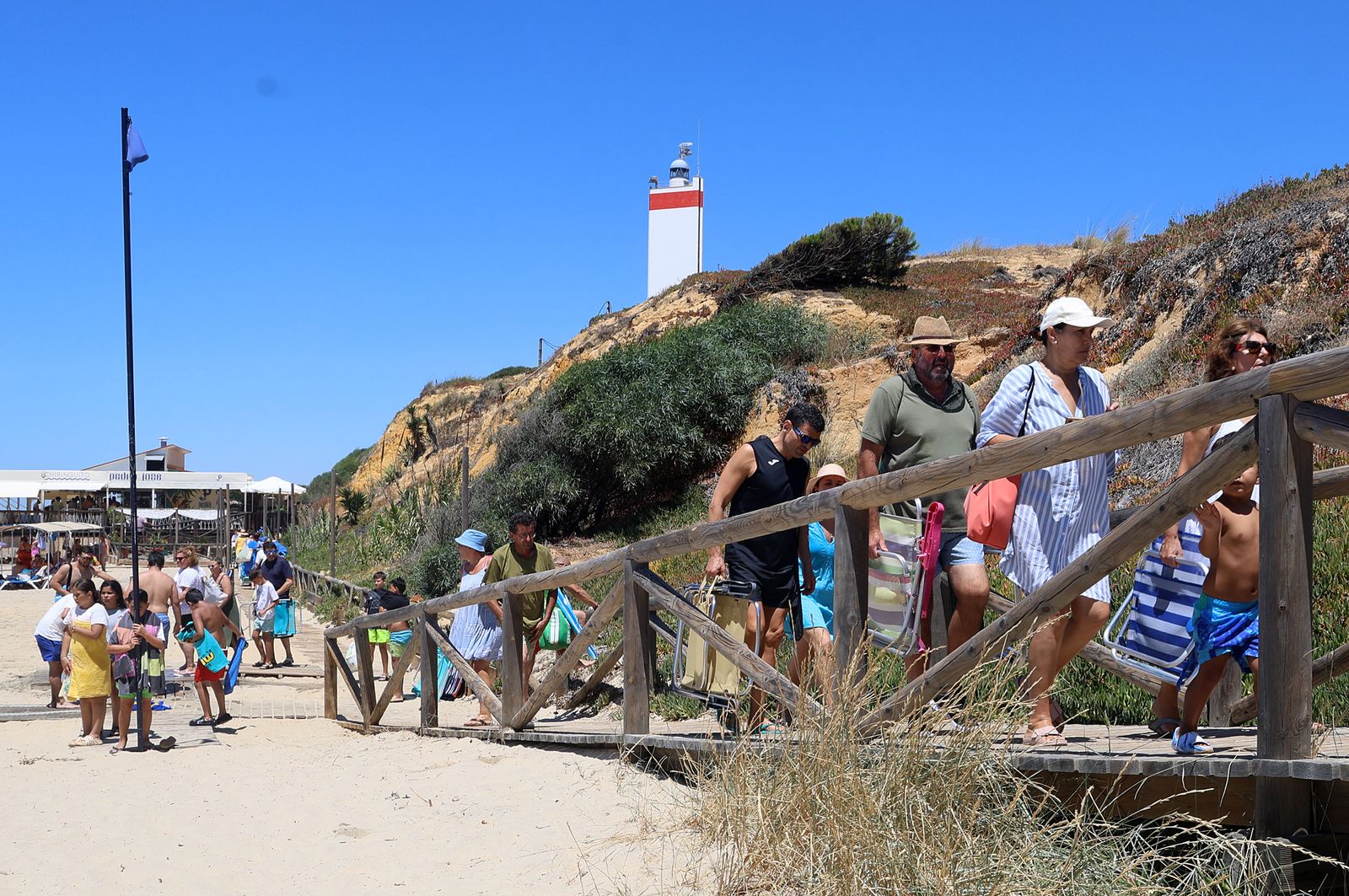 Imágenes de una mañana de calor y playa en Matalascañas