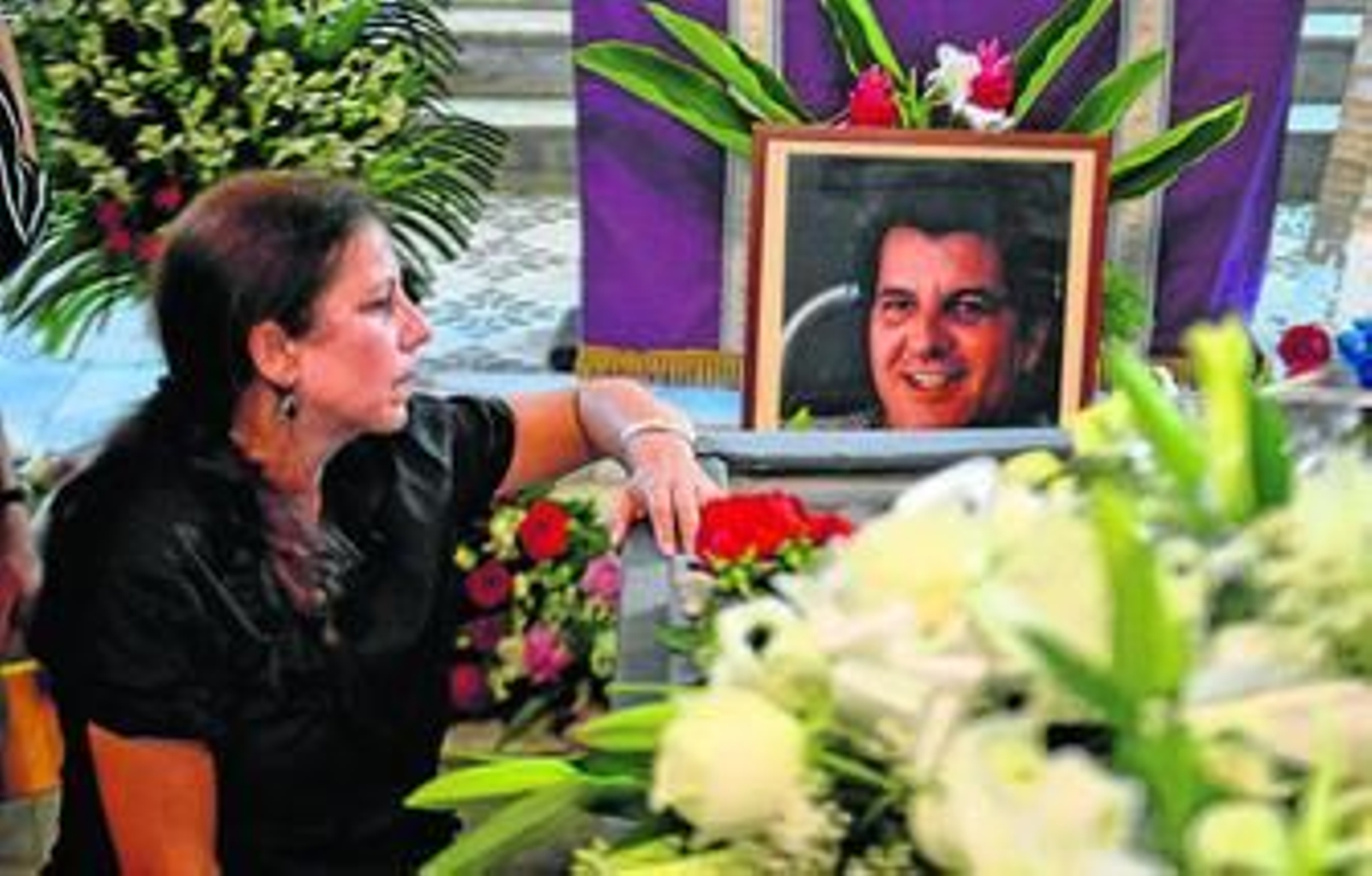 Ofelia Acevedo, viuda de Payá, llora durante su funeral en La Habana. Ofelia Acevedo, viuda de Payá, llora durante su funeral en La Habana.