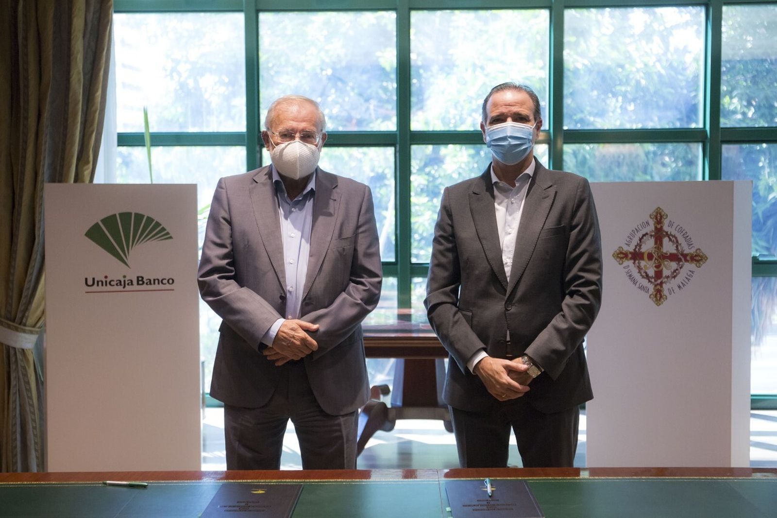 Acuerdo entre Unicaja Banco y la Agrupación de Cofradías de Málaga