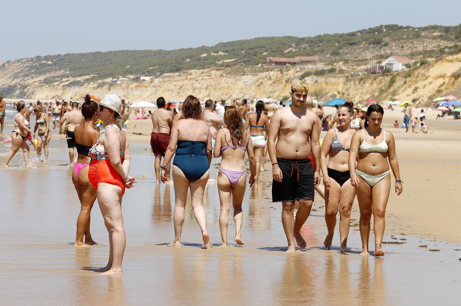 Imágenes de la playa de Matalascañas en un domingo caluroso