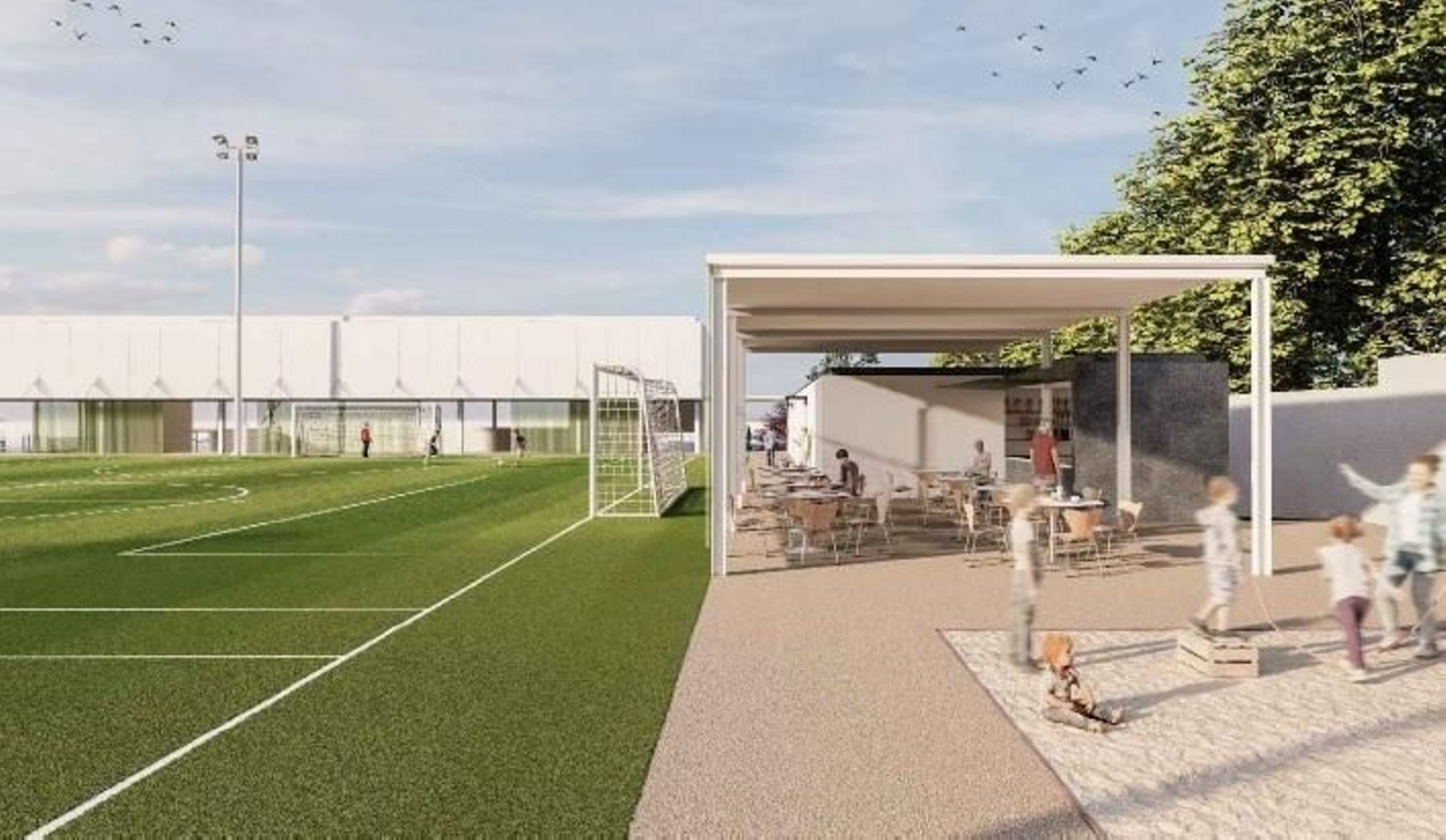 Terraza de la cafetería junto al campo de fútbol.