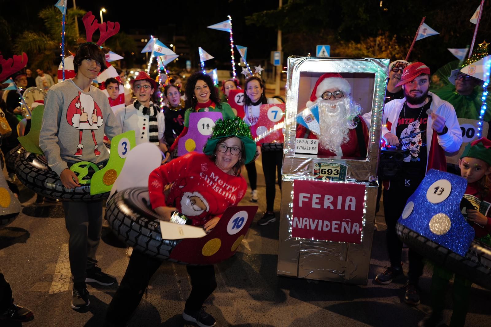 Trolls, coches de choque, bolsas de regalo o exploradores del Parque Jurásico: Así ha sido la San Silvestre de Motril