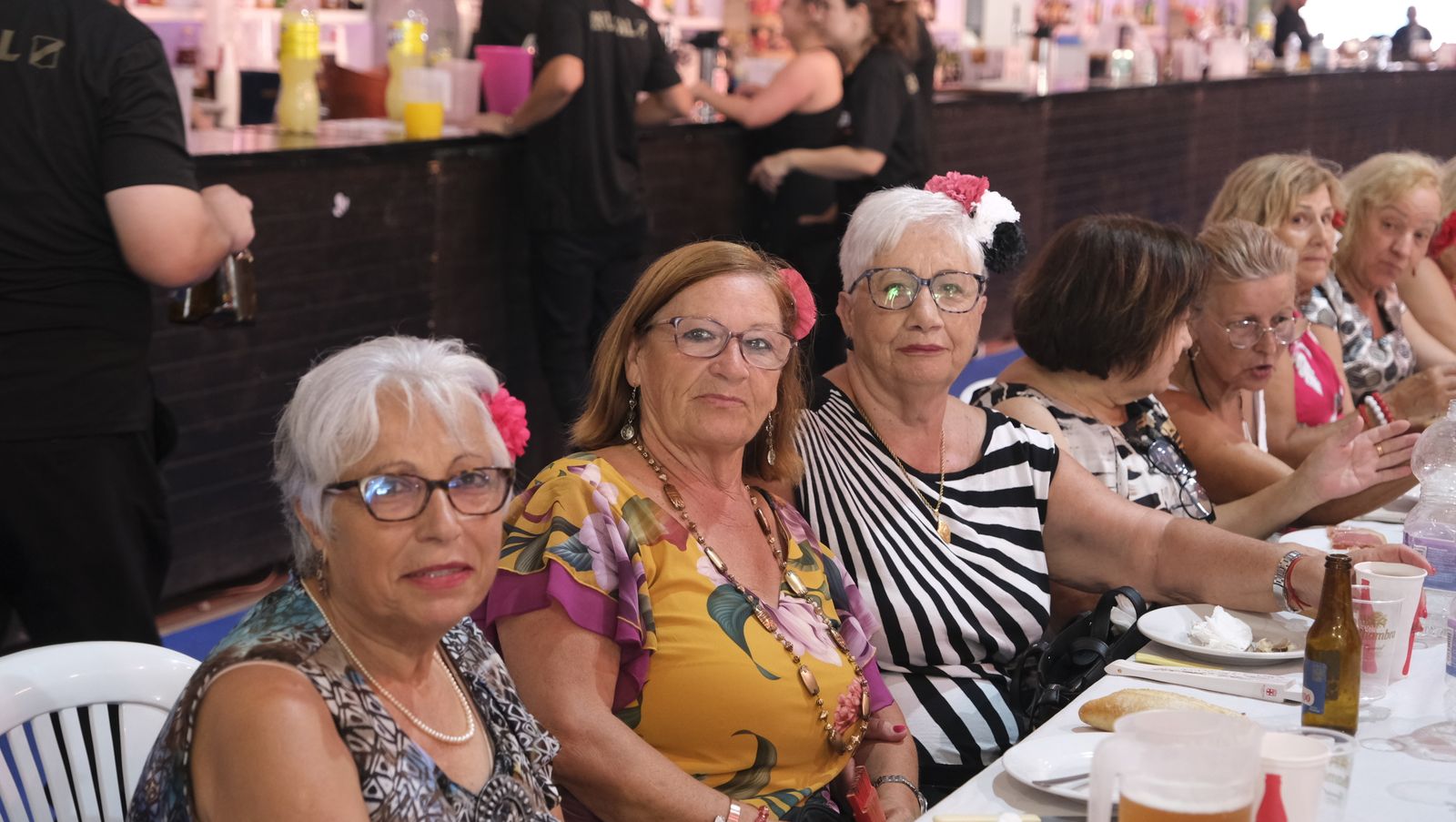 Imágenes de la comida homenaje a los mayores en la Caseta Municipal de la Feria de Almería 2022