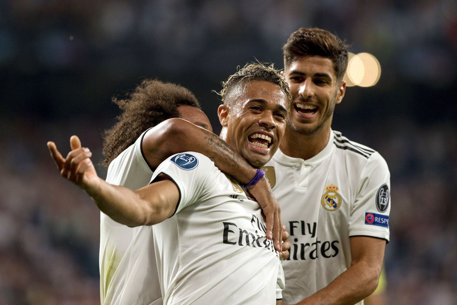 Mariano celebra su tanto con Marcelo y Asensio.