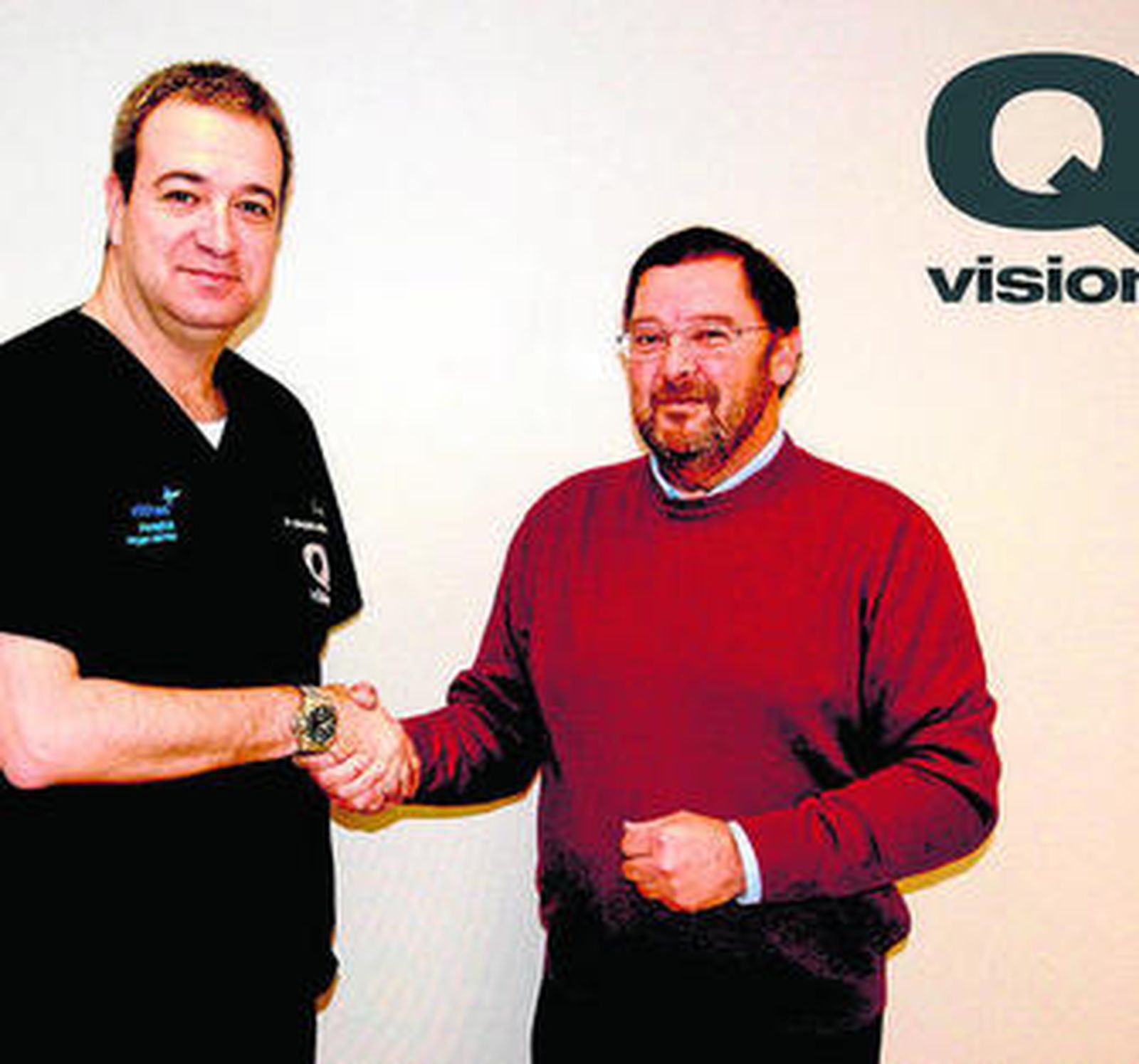 Los responsables de QVision y UNICEF.