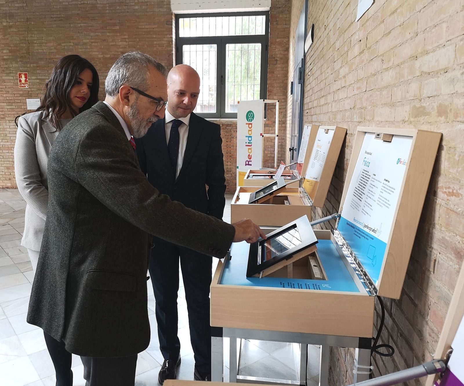Inauguración de la exposición 'Realidades', en el Hogar Virgen de los Reyes.