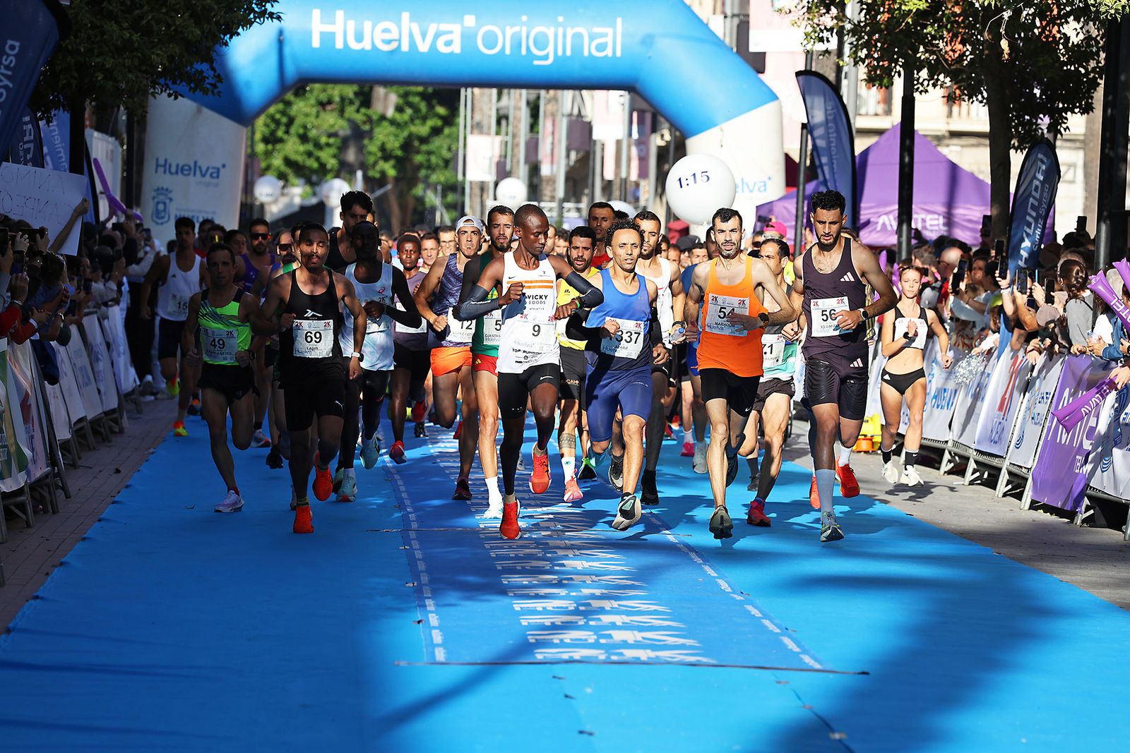 Las mejores imágenes de la carrera 21K Ciudad de Huelva