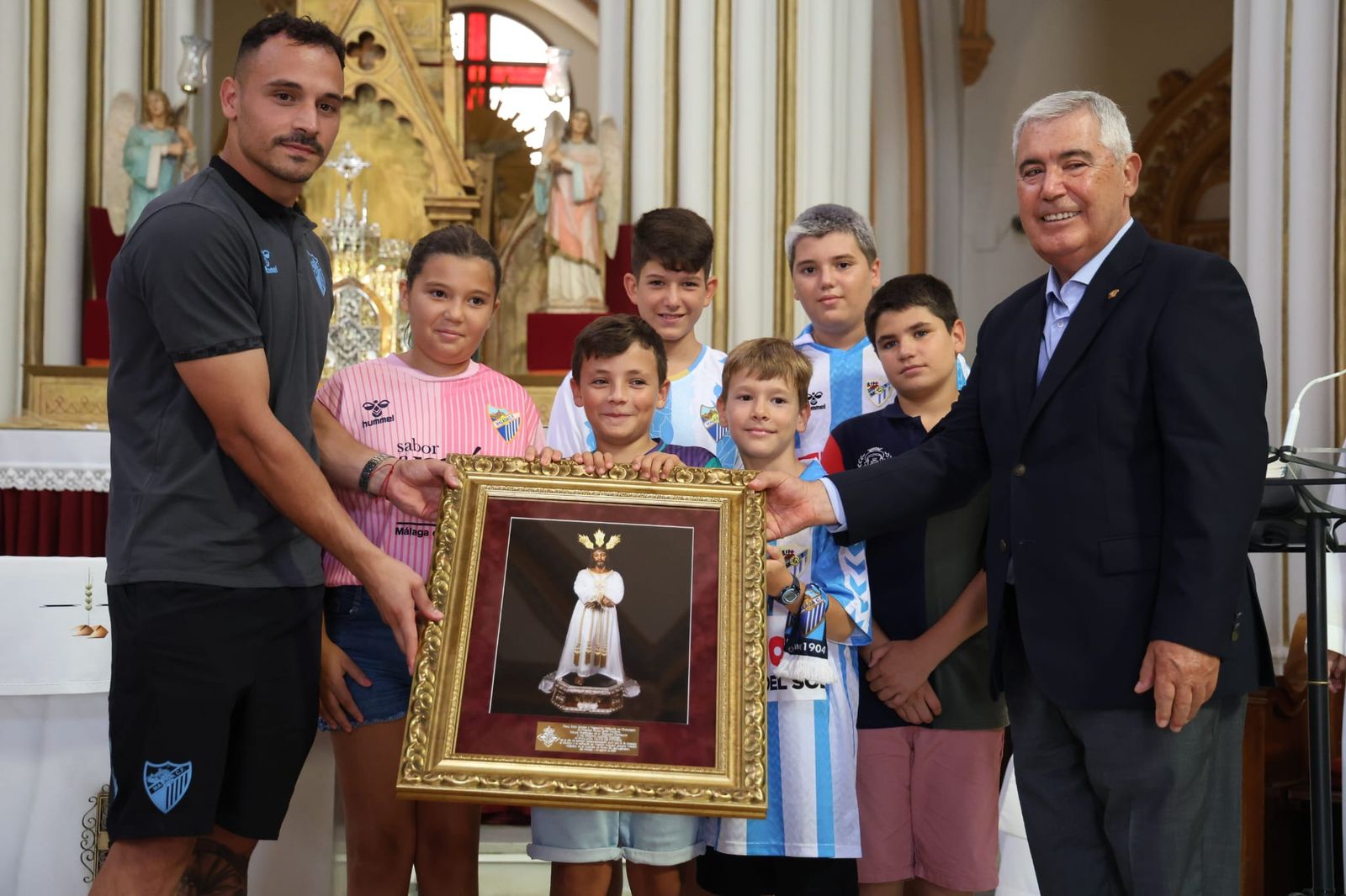 Las fotos del Málaga CF en su visita al Cautivo