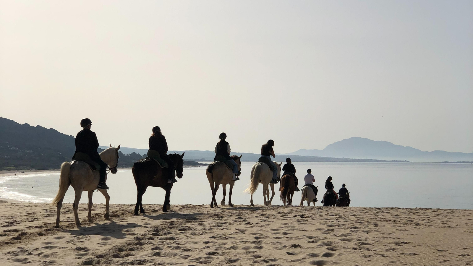 Pasear a caballo por la playa
