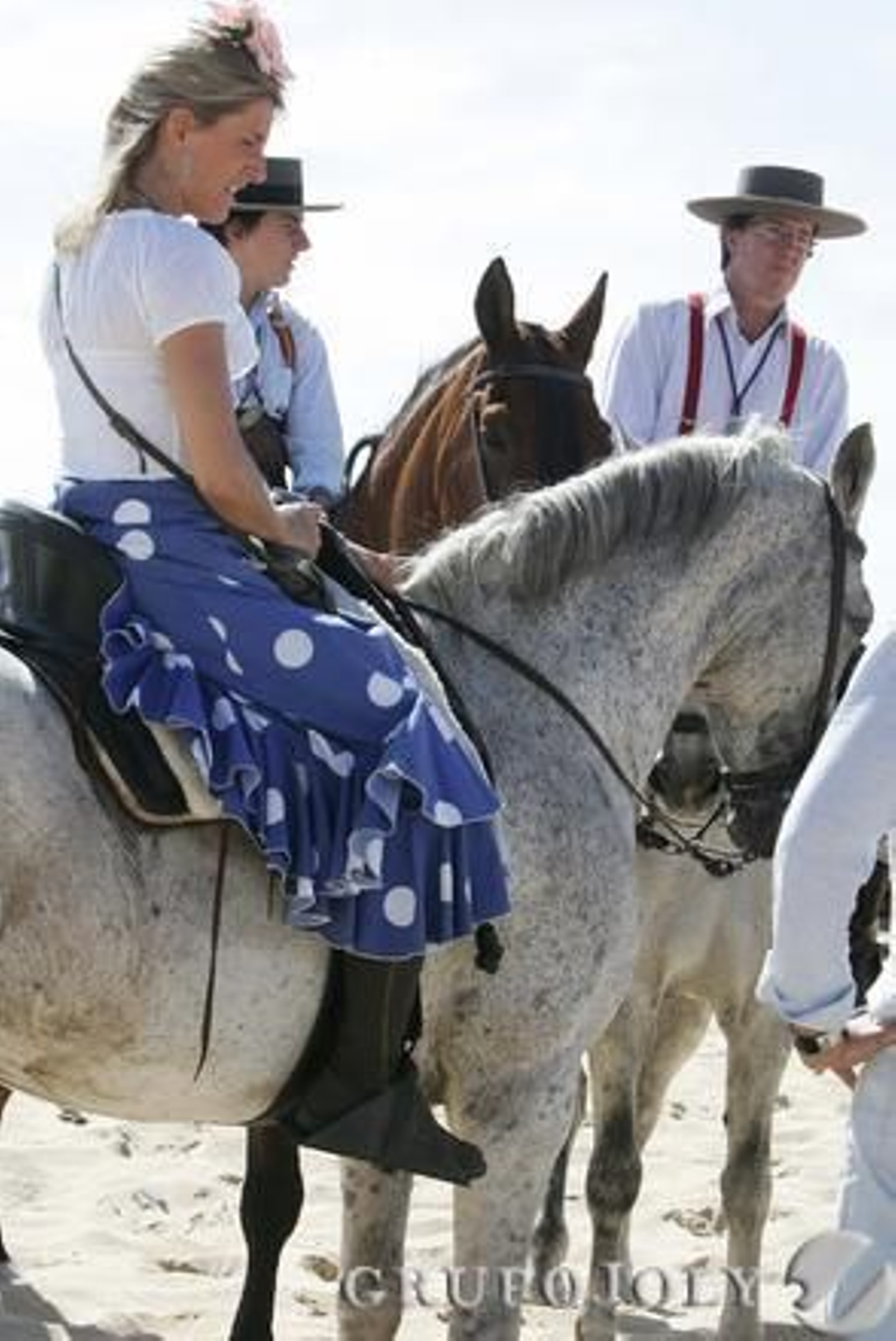 Una pareja de caballistas

Foto: Pascual