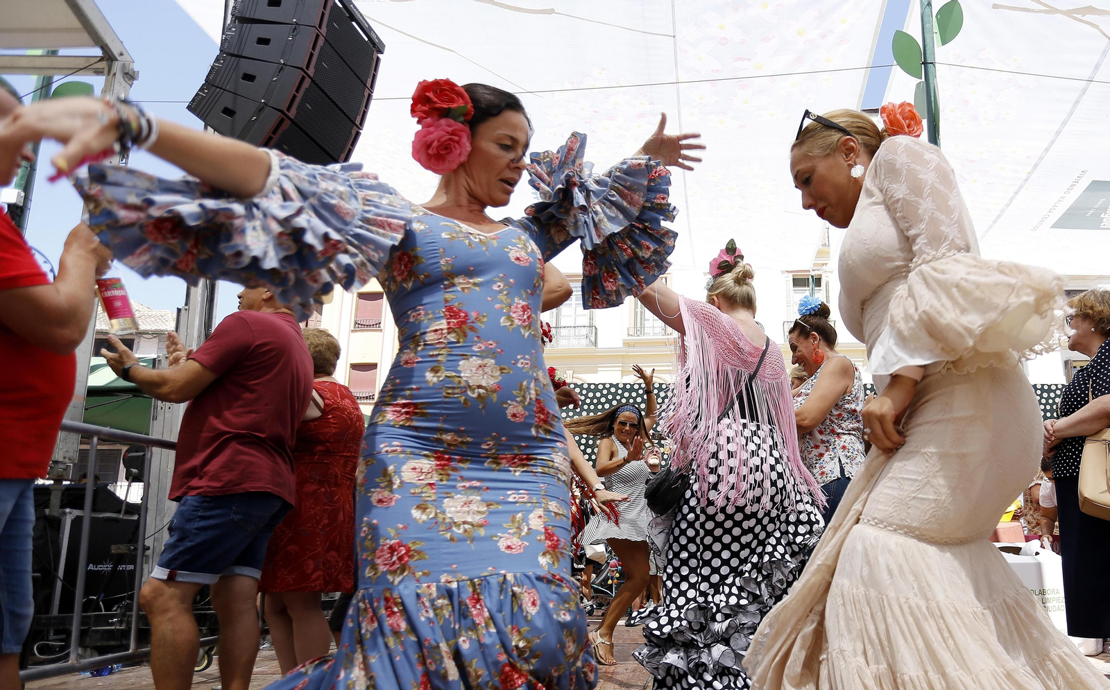 Fotos del cuarto día de Feria de Málaga en el Centro y la noche en el Real