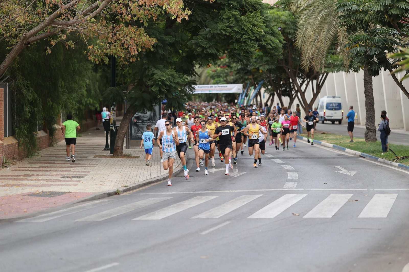 Las fotos de la VIII Carrera de la Prensa y la IV Marcha Solidaria de Málaga