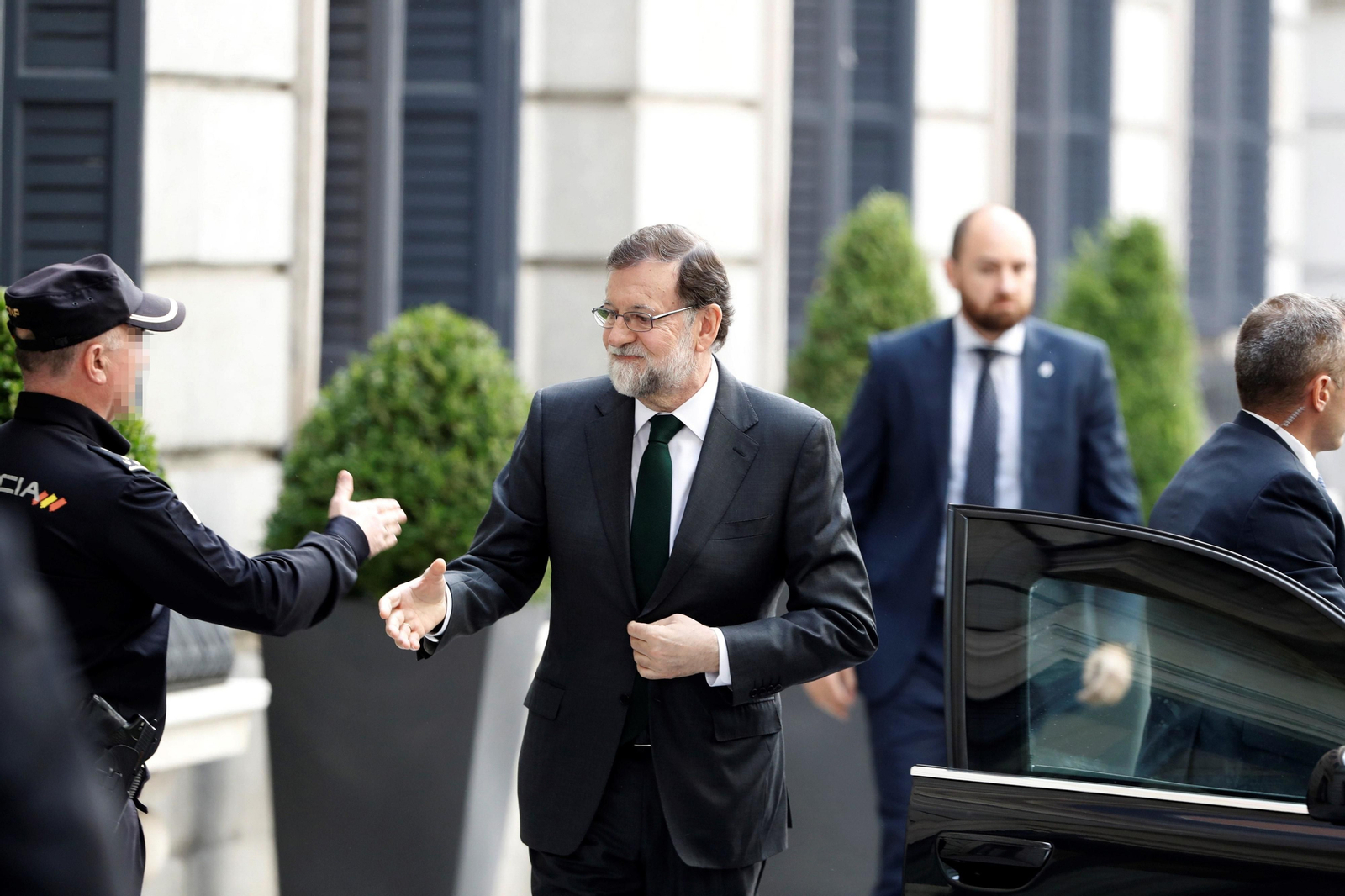 Rajoy, a su llegada al Congreso.