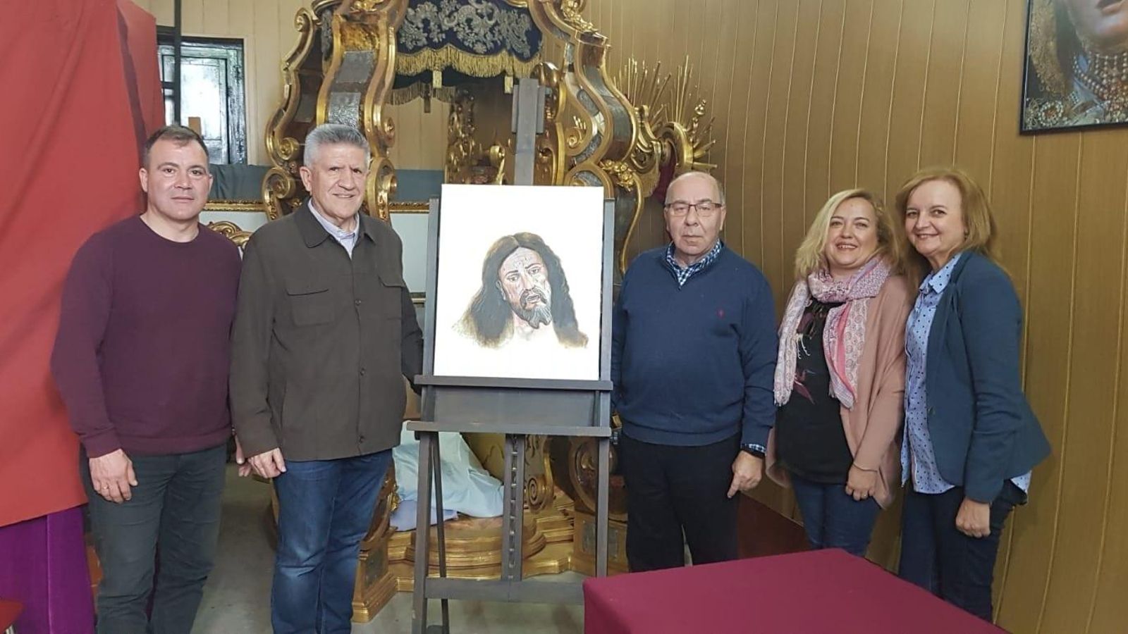 El pintor del paño de Afligidos, con el hermano mayor (Ramón Velázquez) y otros miembros de la hermandad.