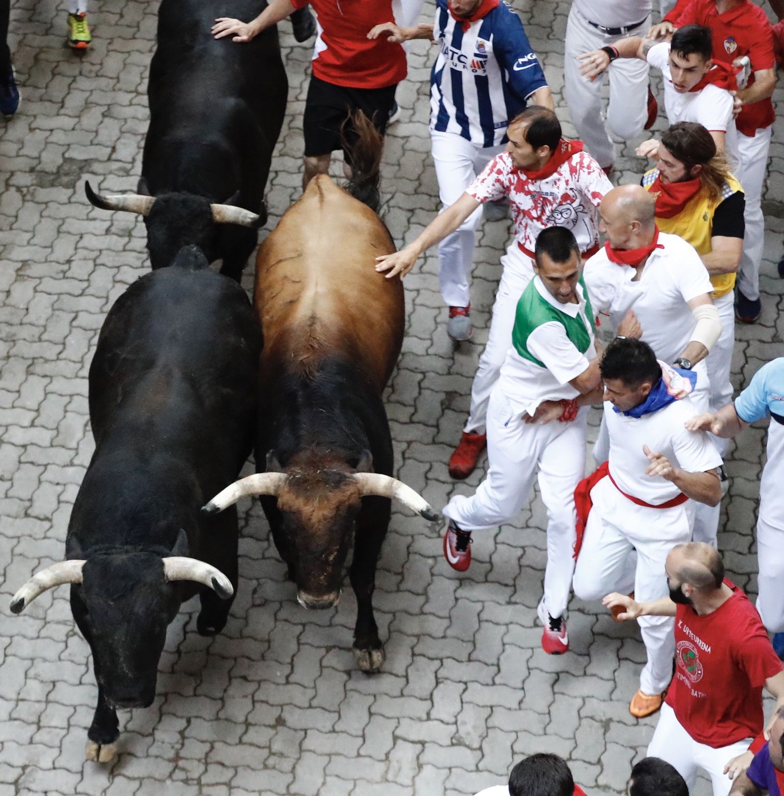 El sexto encierro de los Sanfermines, en imágenes