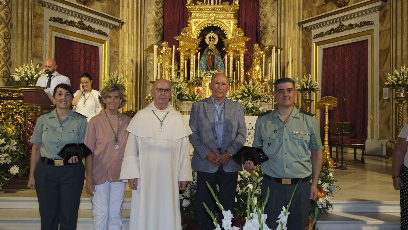 Imágenes de la ofrenda floral a la Virgen del Mar. Feria de Almería 2022