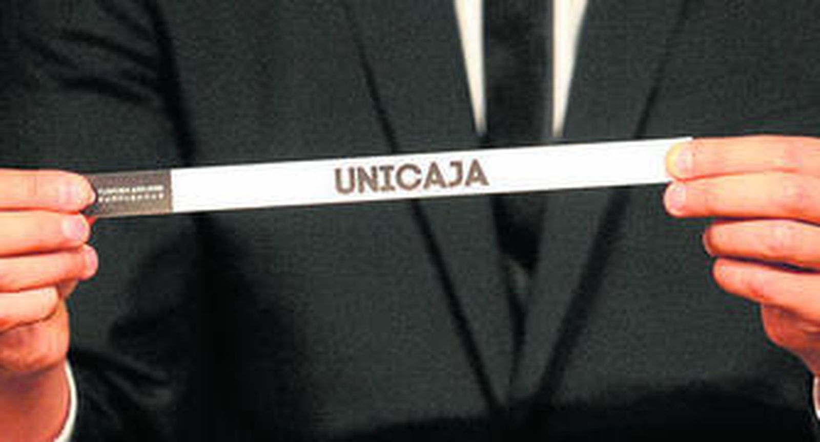 El nombre del Unicaja se muestra a la cámara durante el último sorteo de Euroliga.