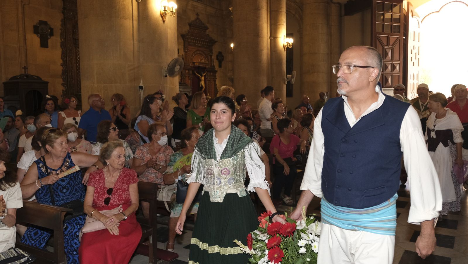 Imágenes de la ofrenda floral a la Virgen del Mar. Feria de Almería 2022